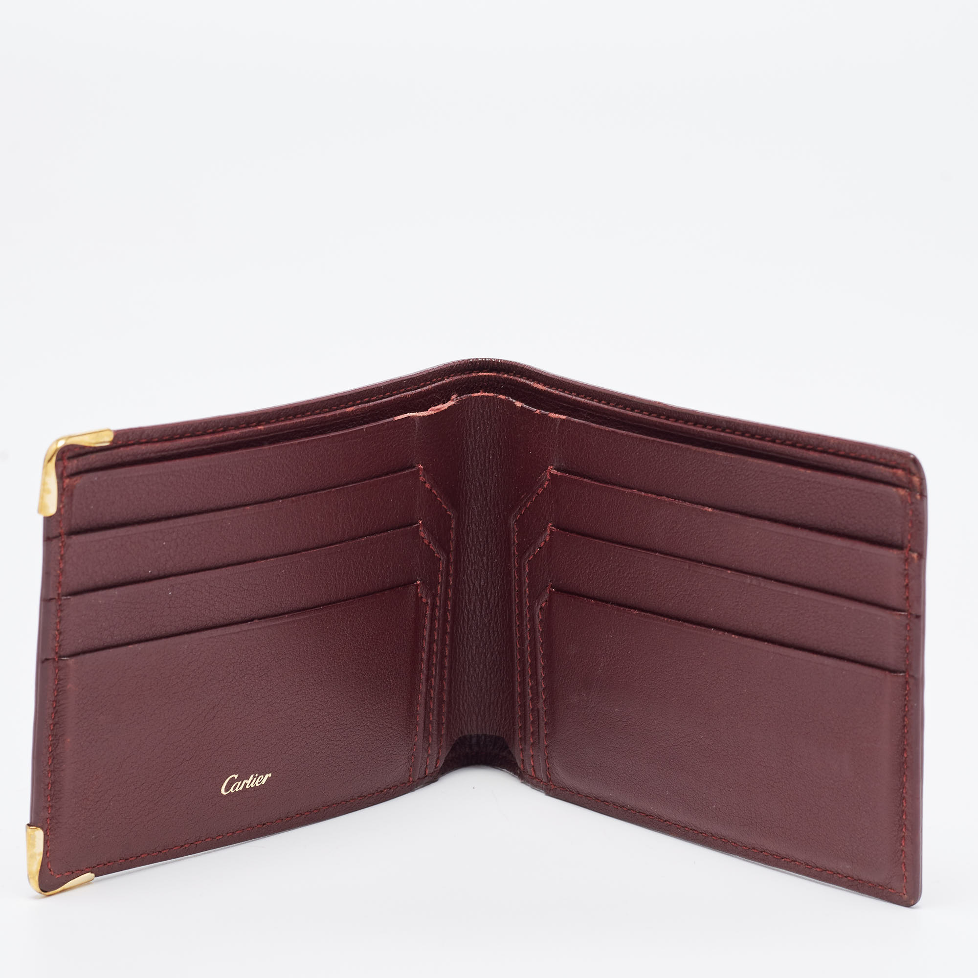 

Cartier Burgundy Leather Must De Cartier 6CC Bifold Wallet