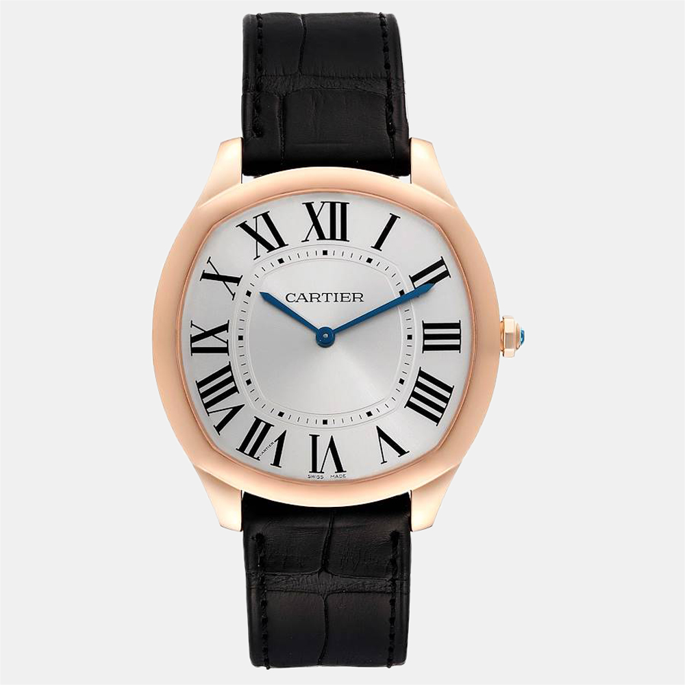 Looking for a fabulous accompaniment to your ensembles? Go for this elegantly styled Cartier wristwatch. The watch boasts a silver guilloche dial featuring painted black Roman numeral hour markers with a cushion shape 18k rose gold case and an 18k rose gold concave bezel. It is secured by a black leather strap with an 18k rose gold deployant buckle.