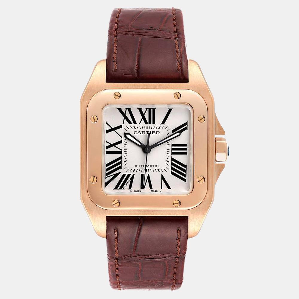 This gorgeous Cartier wristwatch offers the perfect finish to an eye catching everyday look. The watch boasts a silver dial featuring painted radial Roman numerals and sword shaped hands with an 18K rose gold case and an 18K rose gold bezel punctuated with 8 signature screws. It is secured by a brown leather strap with an 18K rose gold double deployant clasp.