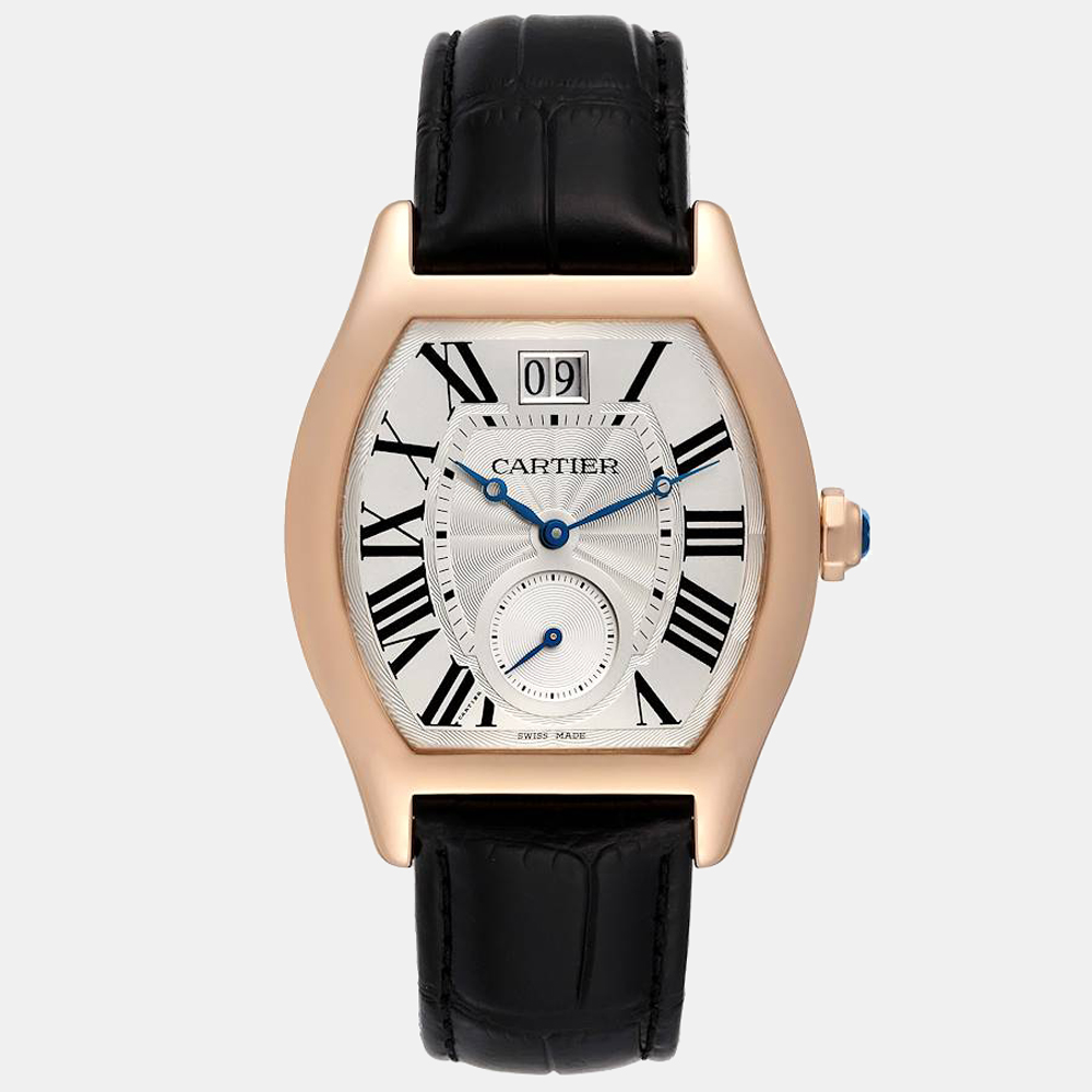 For a touch of modern elegance go for this stylish Cartier Tortue wristwatch. The watch boasts a silver flinque dial featuring blue apple shaped hands black Roman numeral hour markers and a date display with an 18k rose gold tonneau shaped case. It is secured by a black leather strap with an 18k rose gold deployant clasp.