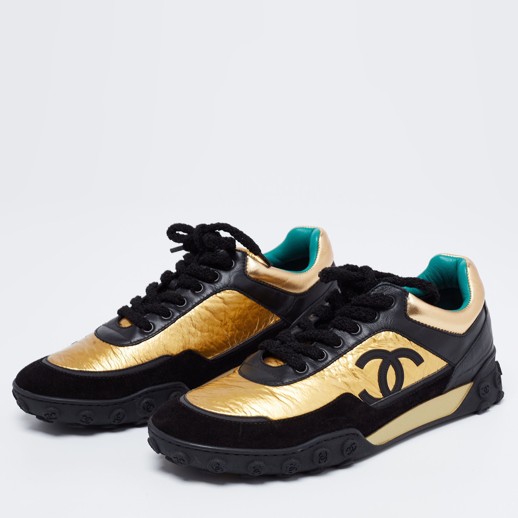 

Chanel Black/Gold Leather and Suede CC Low-Top Sneakers Size