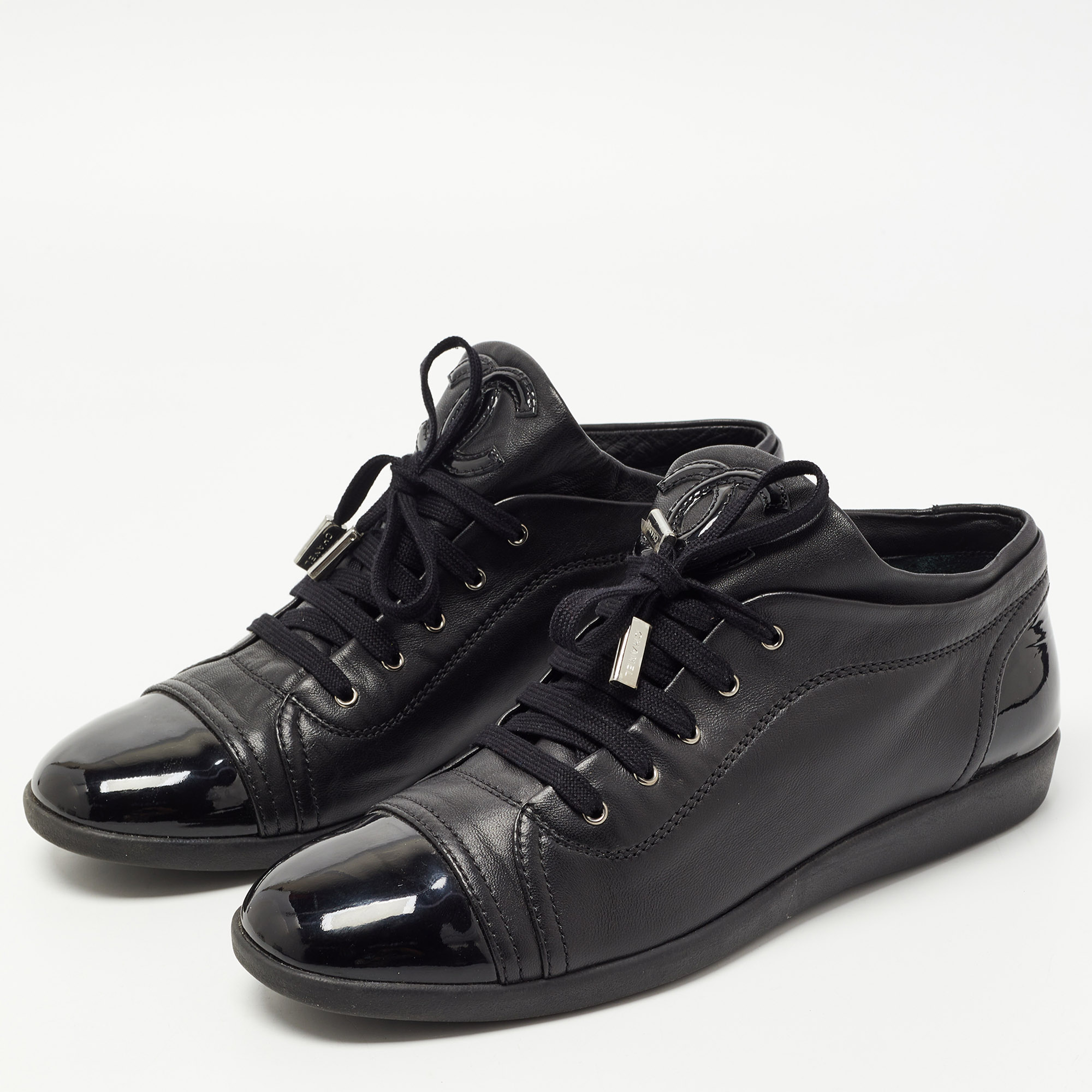 

Chanel Black Leather Cap Toe High Top Sneakers Size