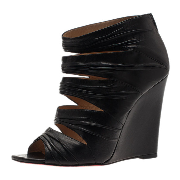 مملوكة مسبقًا Christian Louboutin Black Leather Developpa Wedge Booties Size 39