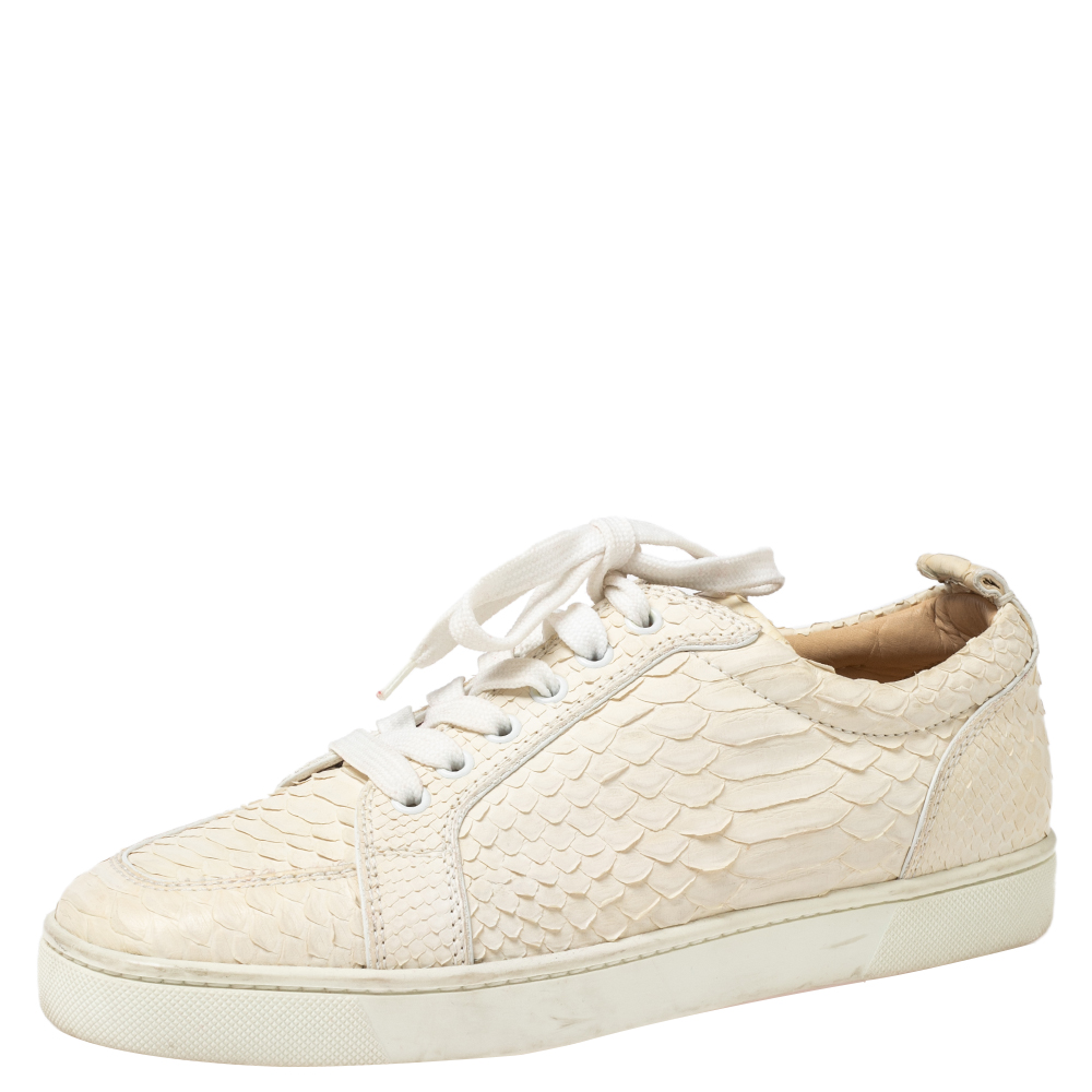 Christian Louboutin brings you this special pair of sneakers crafted from python leather to offer both style and comfort. From its lace tie up to the perfect stitch detailing every feature is perfectly blended to give the pair a unique look.