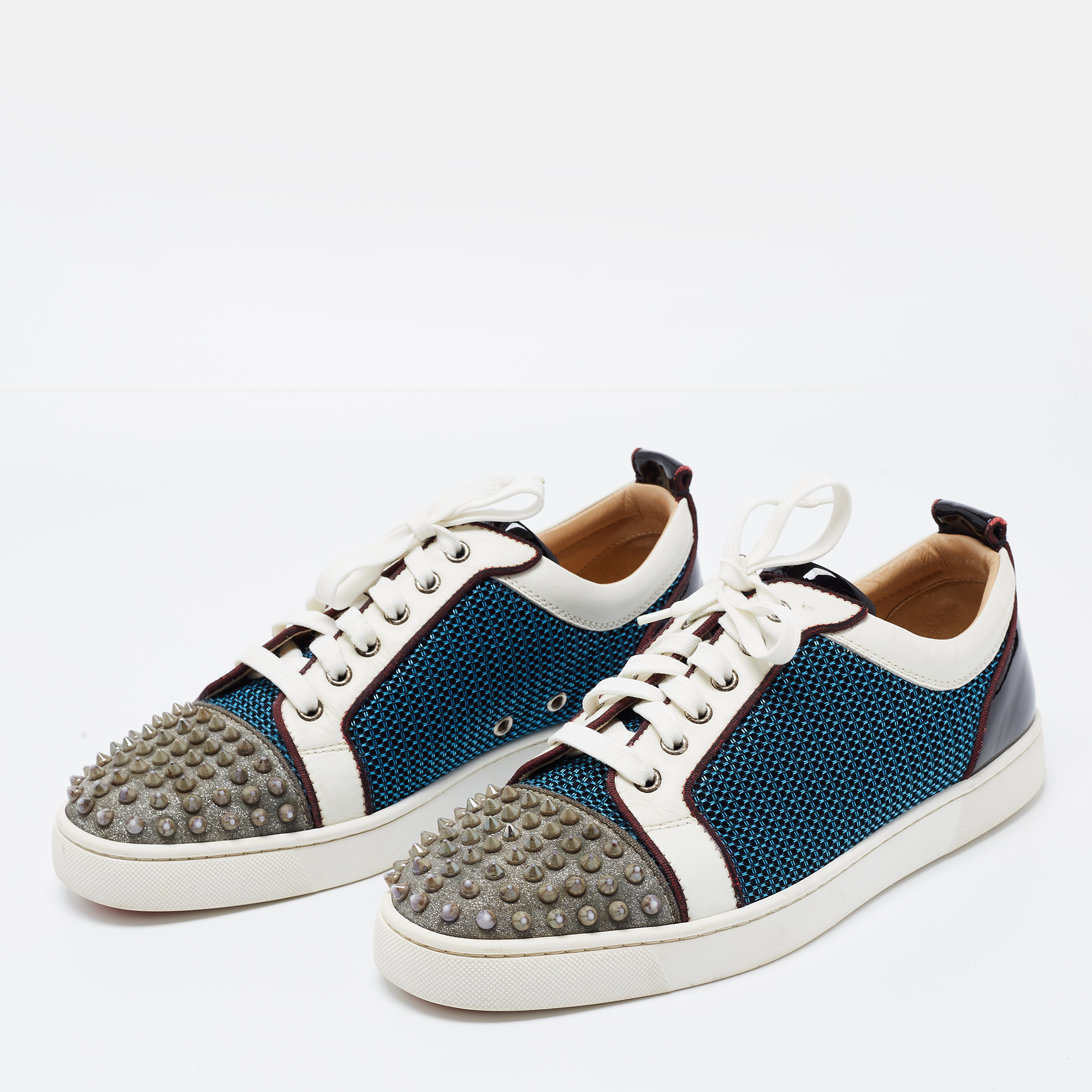 

Christian Louboutin Multicolor Glitter, Mesh and Patent Leather Louis Junior Spikes Low Top Sneakers Size, Blue