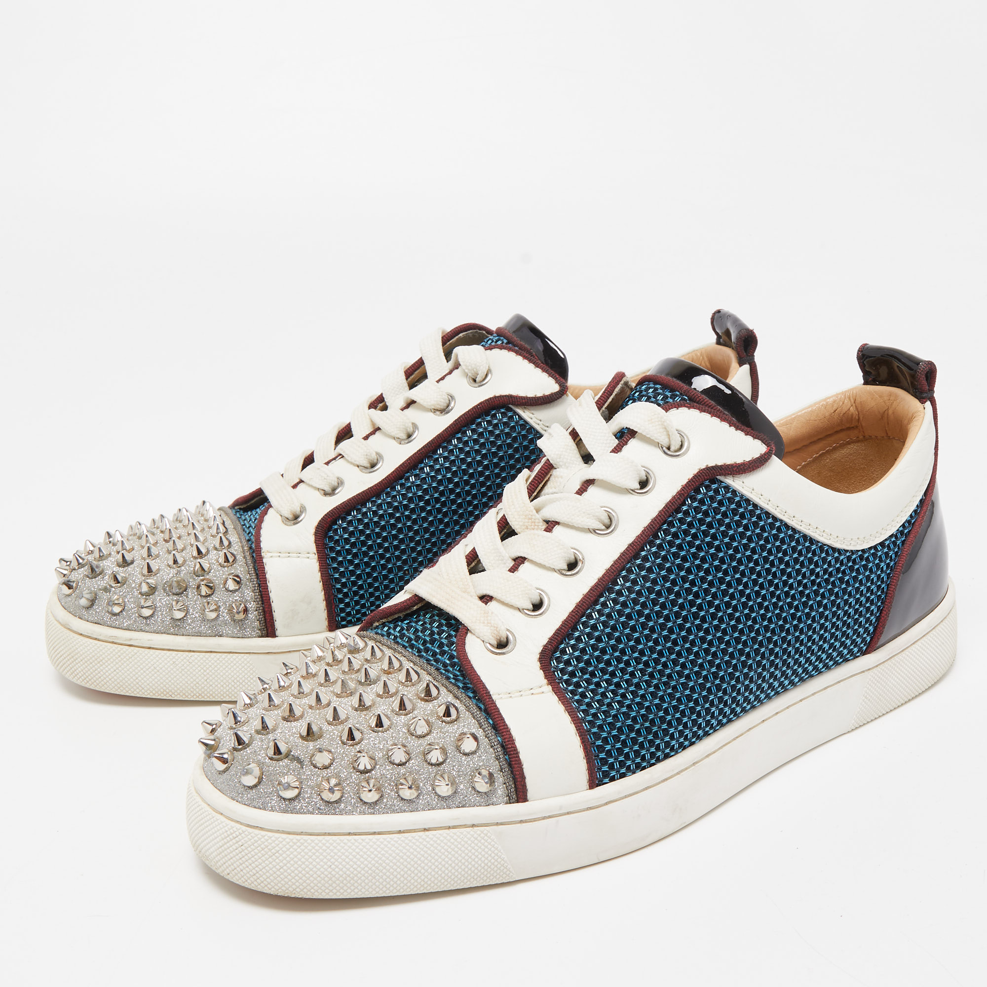 

Christian Louboutin Multicolor Glitter, Mesh and Patent Leather Louis Junior Spikes Low Top Sneakers Size