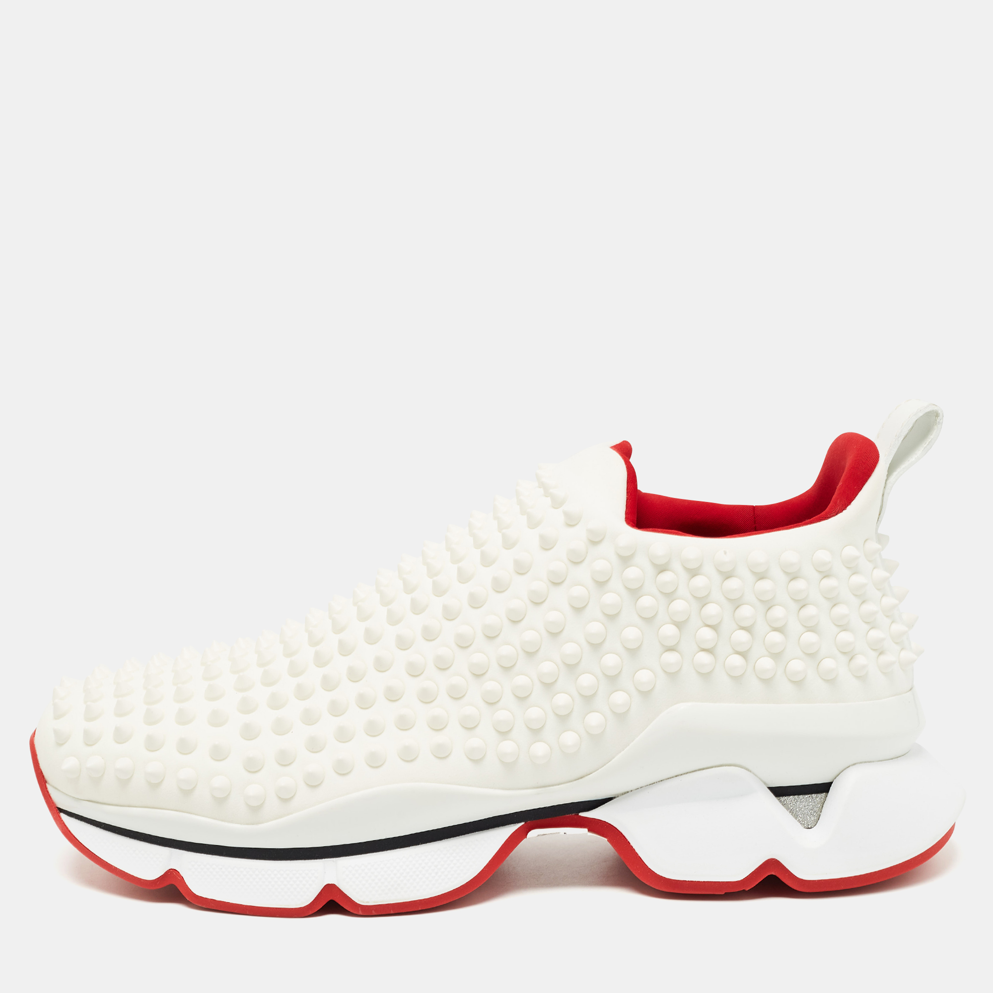 Inspired by the classic Louboutin heels this pair of sneakers bring together effortless comfort and modish style. Featuring an eye catching spike embellished design in a sleek white shade this pair of sneakers comes with a stylish sock slip on construction that makes for a savvy look.