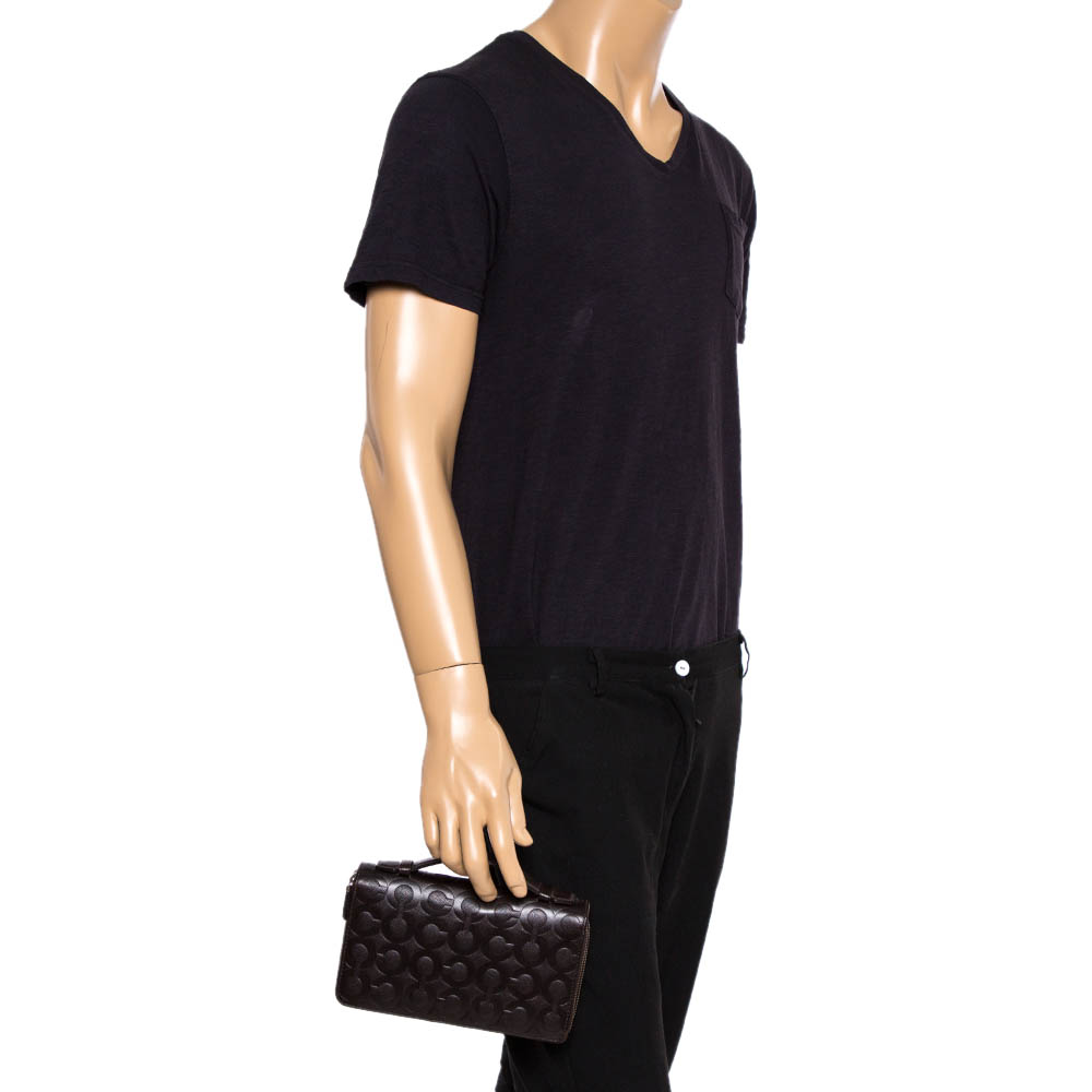 

Coach Dark Brown Signature Embossed Leather Double Zip Clutch