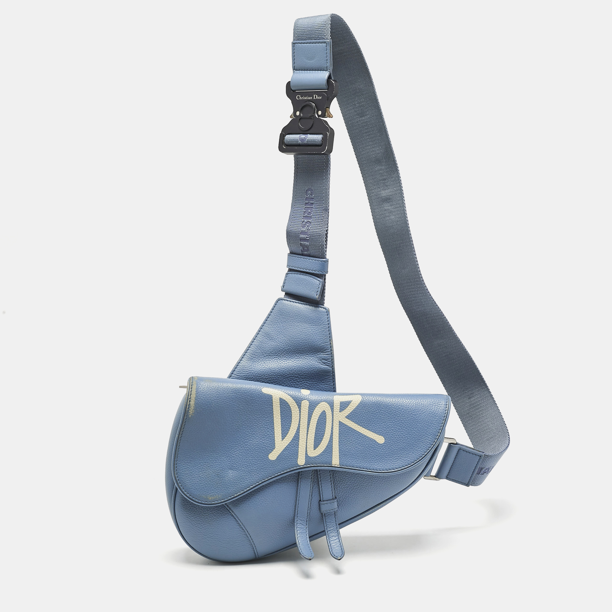 

Dior x Shawn Light Blue Leather Saddle Bag