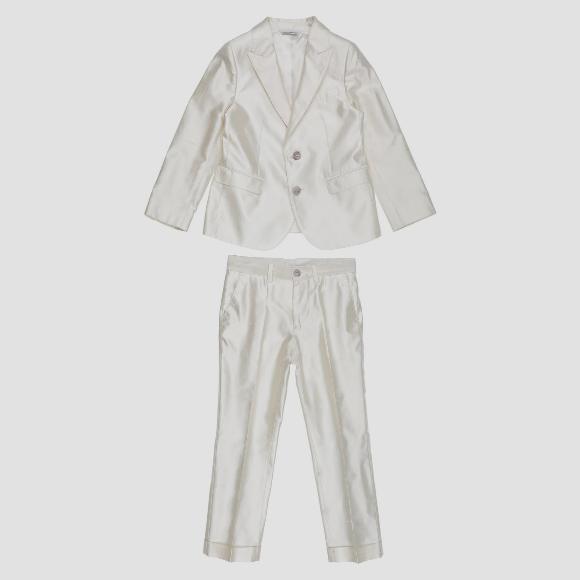 Tailored with care this suit for kids by Dolce and Gabbana is perfect for attending parties and other events. Can be styled with sneakers as well as loafers.