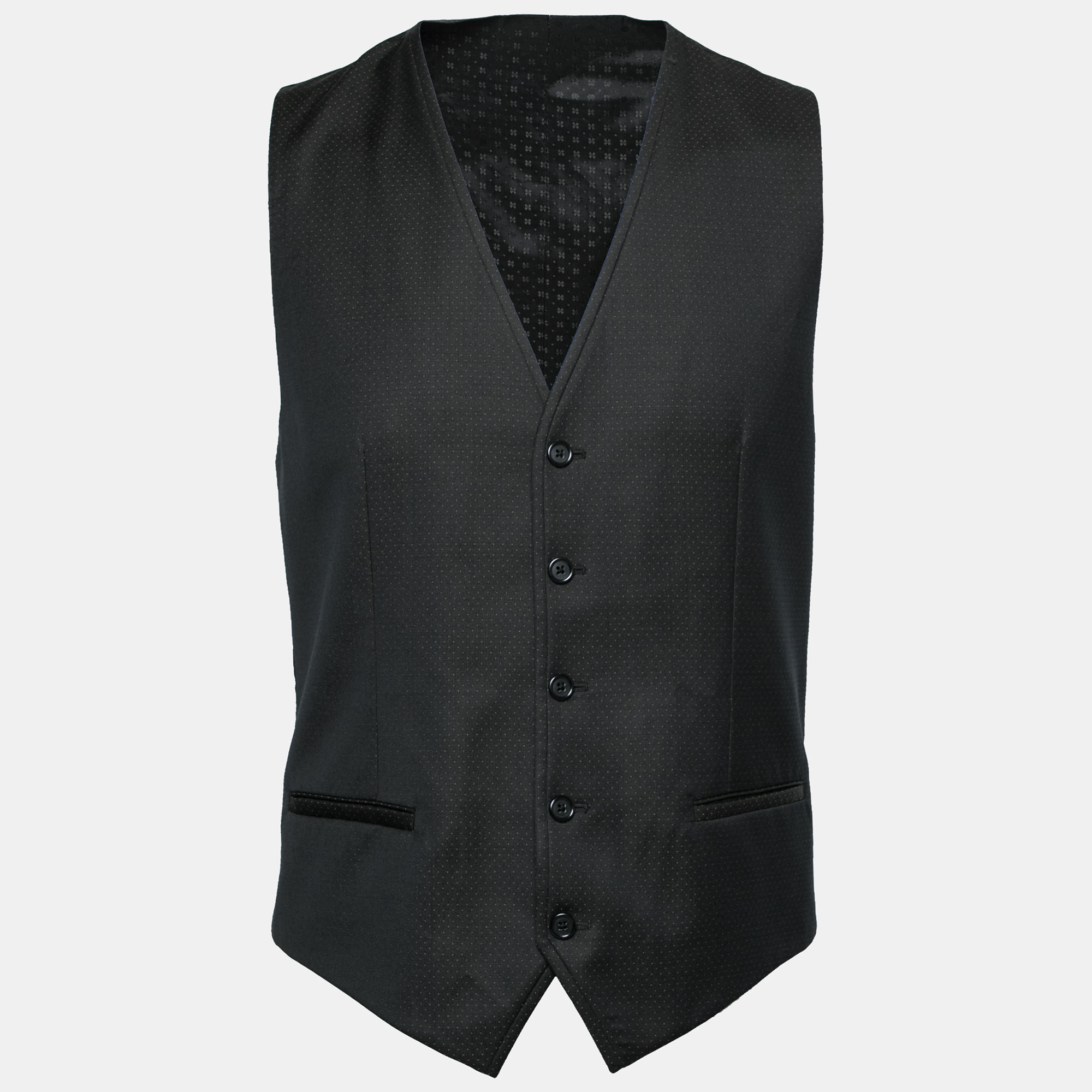 This mens waistcoat from Dolce and Gabbana aims to lend an opulent finish. It is tailored using wool and detailed with polka dots front button closure and a belt strap at the back.
