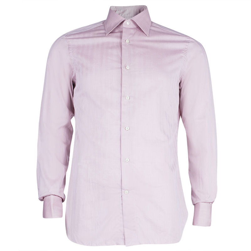 Pink can be for men as any other color. This charming pink shirt by Emenegildo Zegna has been crafted in 100% cotton. It has front button down closure and long cuffed sleeves. It can be paired with lighter shaded formal trousers for a captivating look at work.
