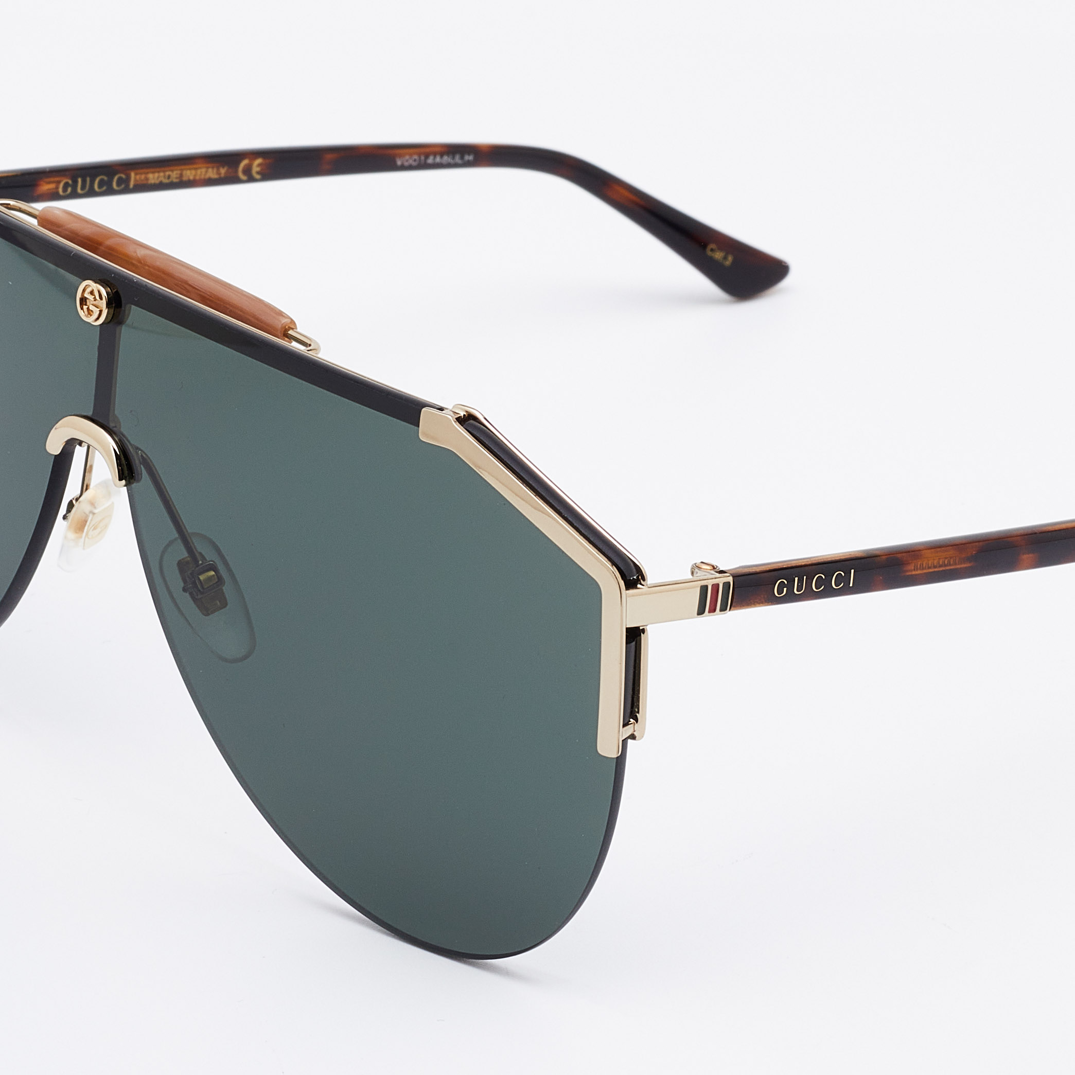 

Gucci Black/Grey Gold Tone Detail GG0584S Tinted Shield Sunglasses