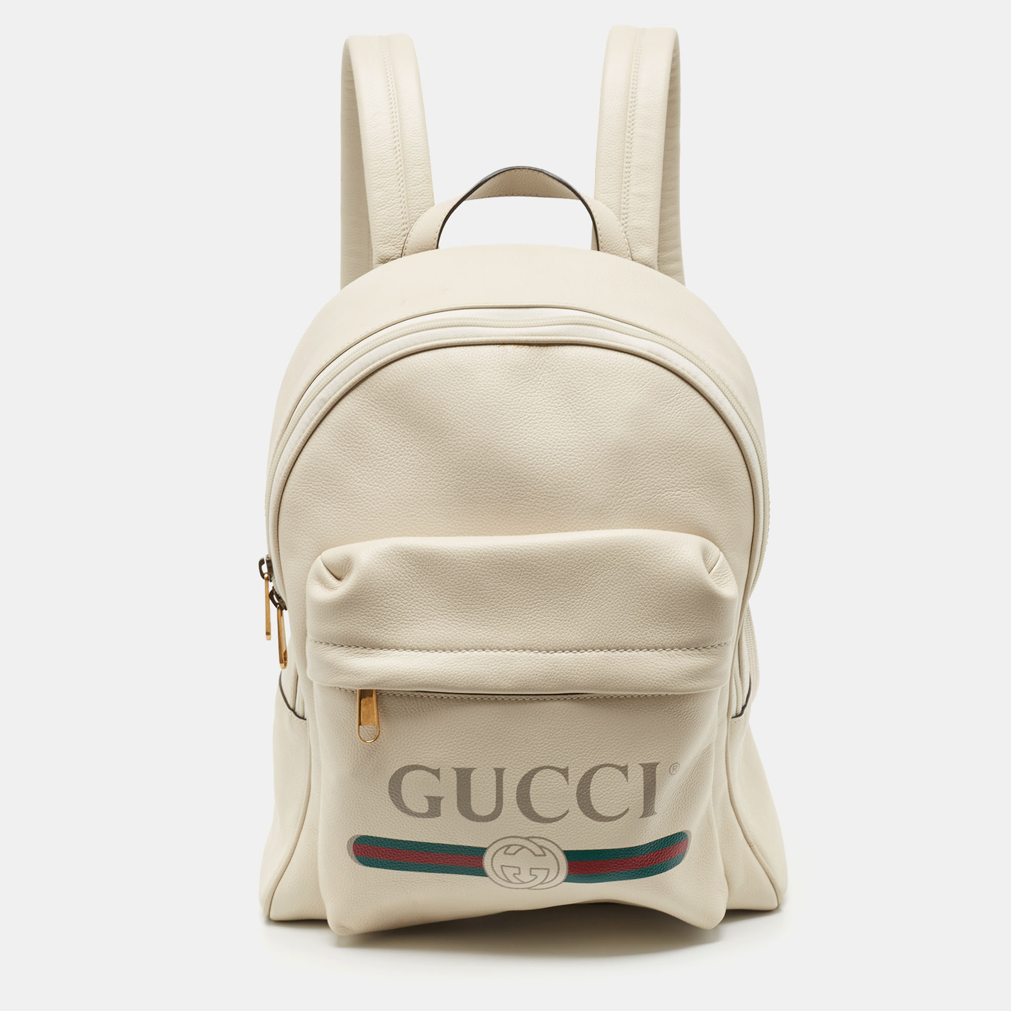

Gucci Off White Leather Vintage Logo Print Backpack