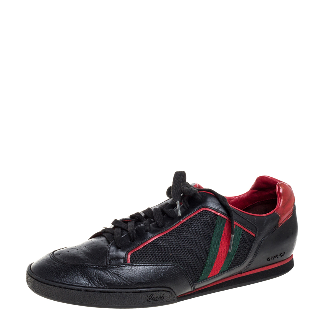 These tennis sneakers from Gucci are crafted from mesh fabric and leather and flaunt a low top frame. It features the signature web detailing on the side panels round toes and laces on the vamps. The black and red combination is the key detail of these stylish sneakers.