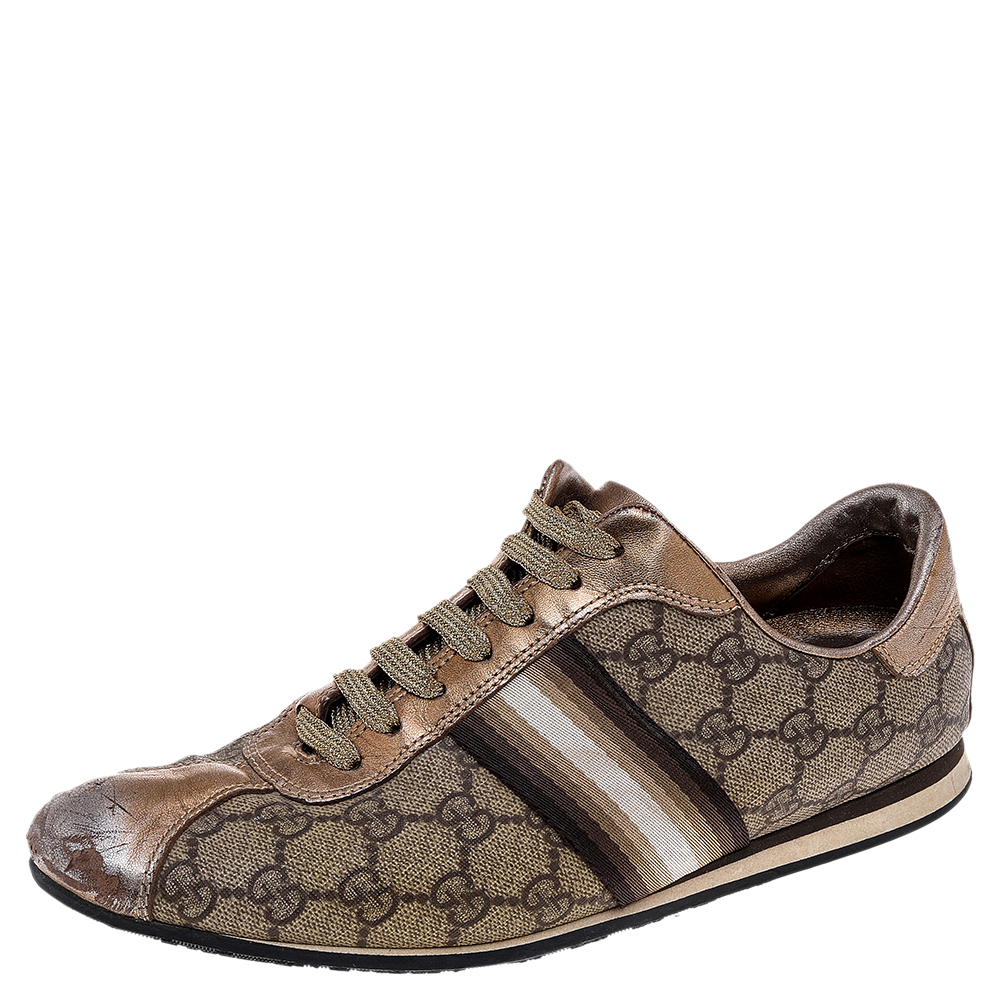Step into these Gucci sneakers for instant comfort They feature the iconic Gucci Web detail and gold leather trims on the signature GG Supreme canvas exterior. They are lined with leather and finished with lace ups. Pair these with practical casuals for a sporty and fashionable look.