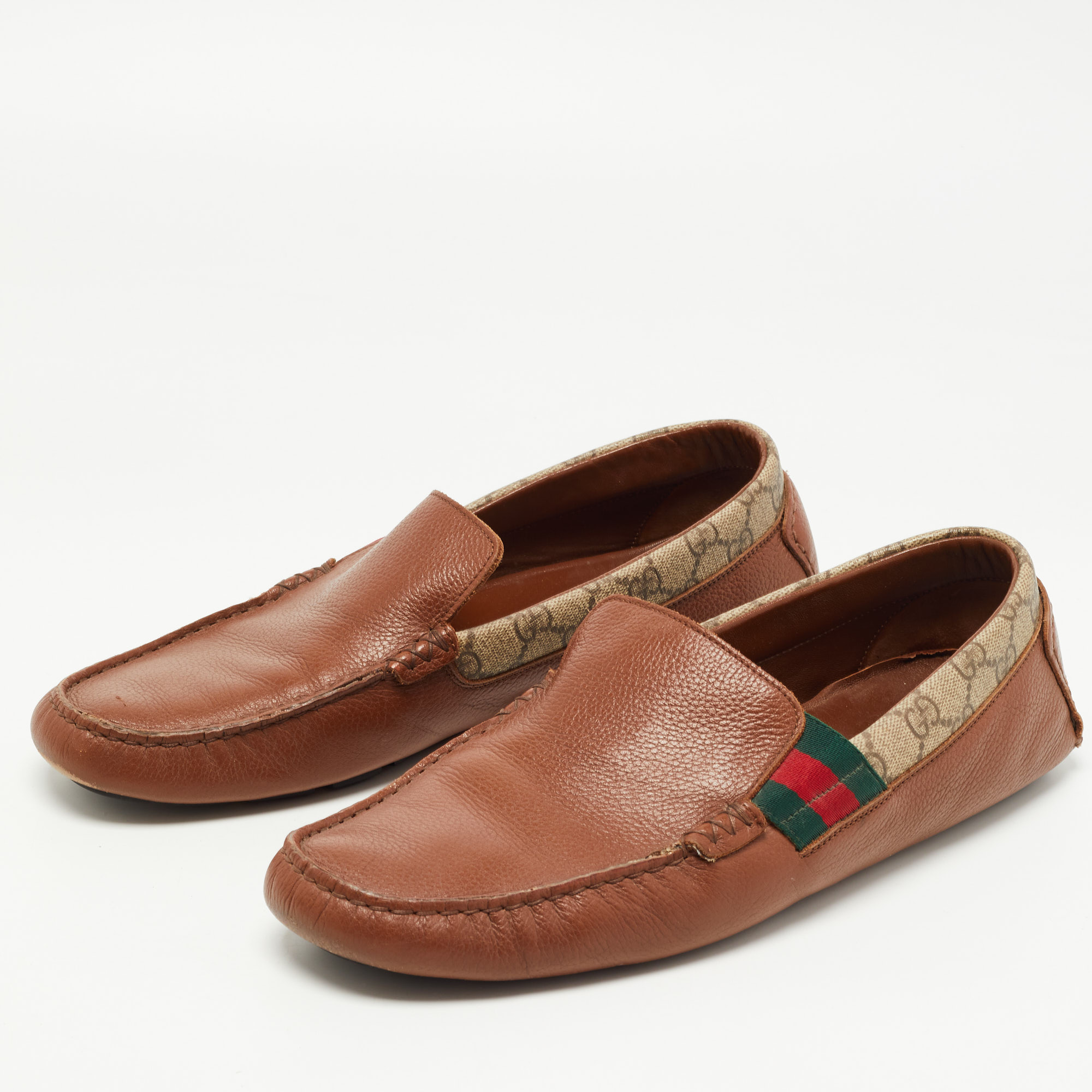 

Gucci Brown Leather and Canvas Slip On Loafers Size