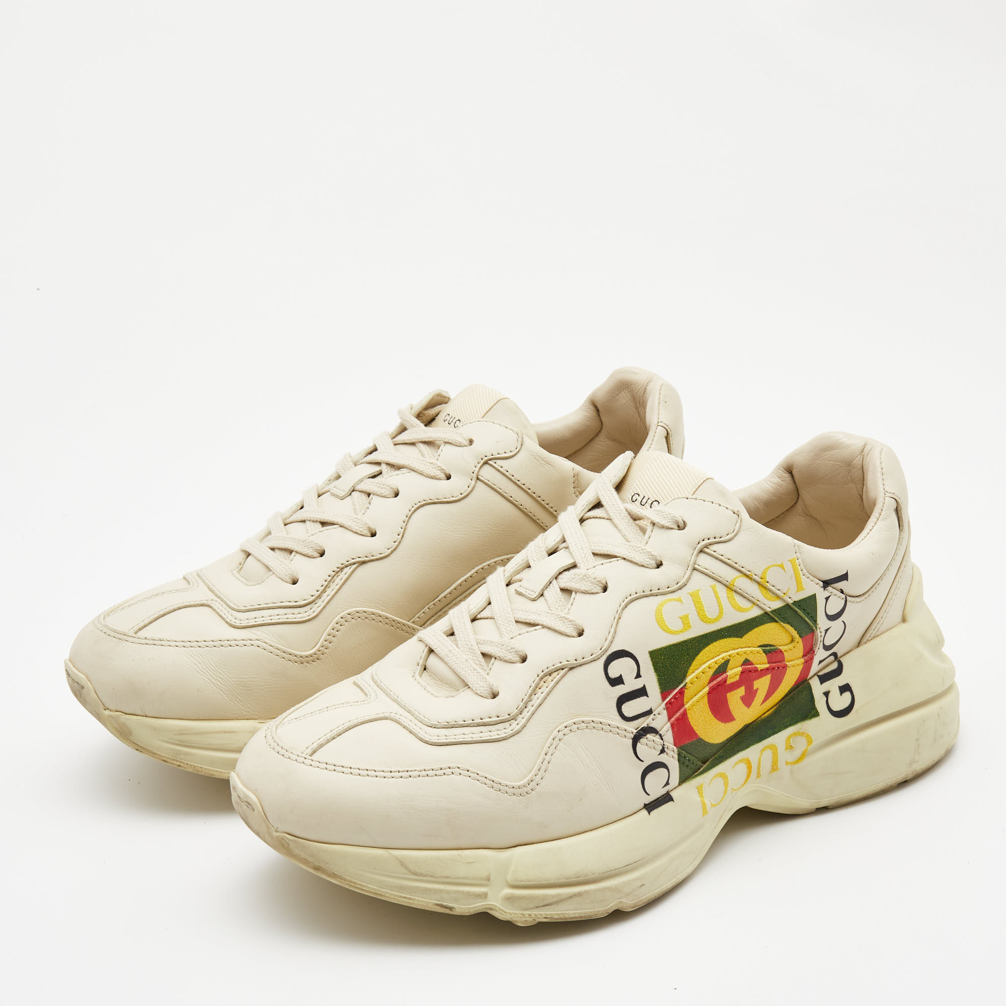 

Gucci Cream Leather Logo Print Rhyton Sneakers Size