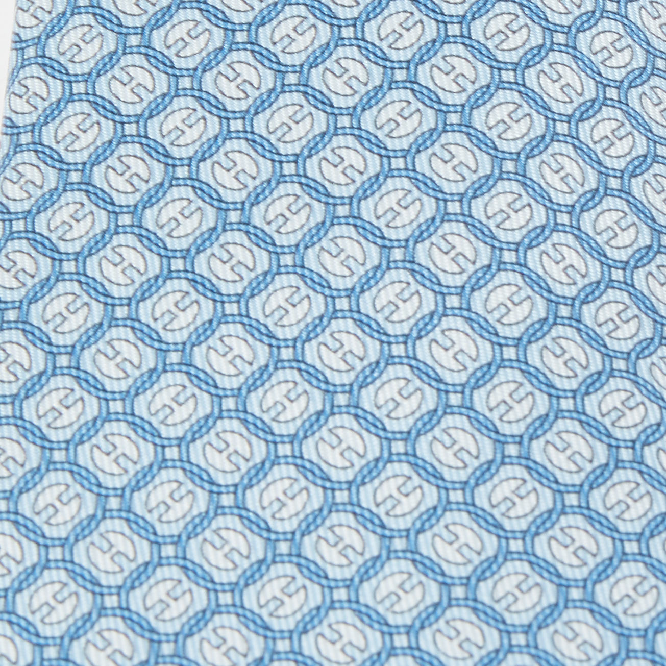 

Hermès Blue La Roue Tourne Printed Silk Slim Tie
