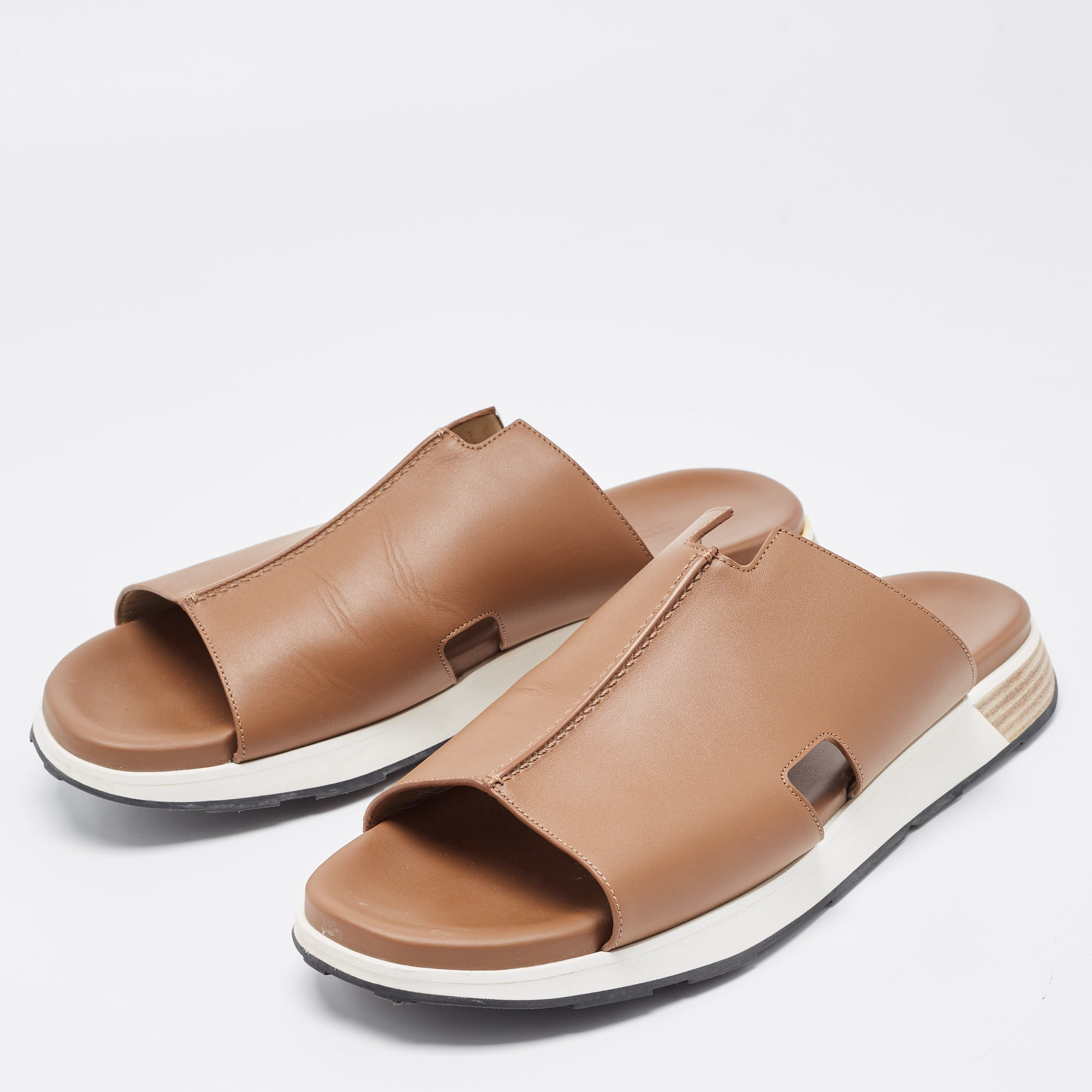 

Hermes Brown Leather Pharaon Slides Size