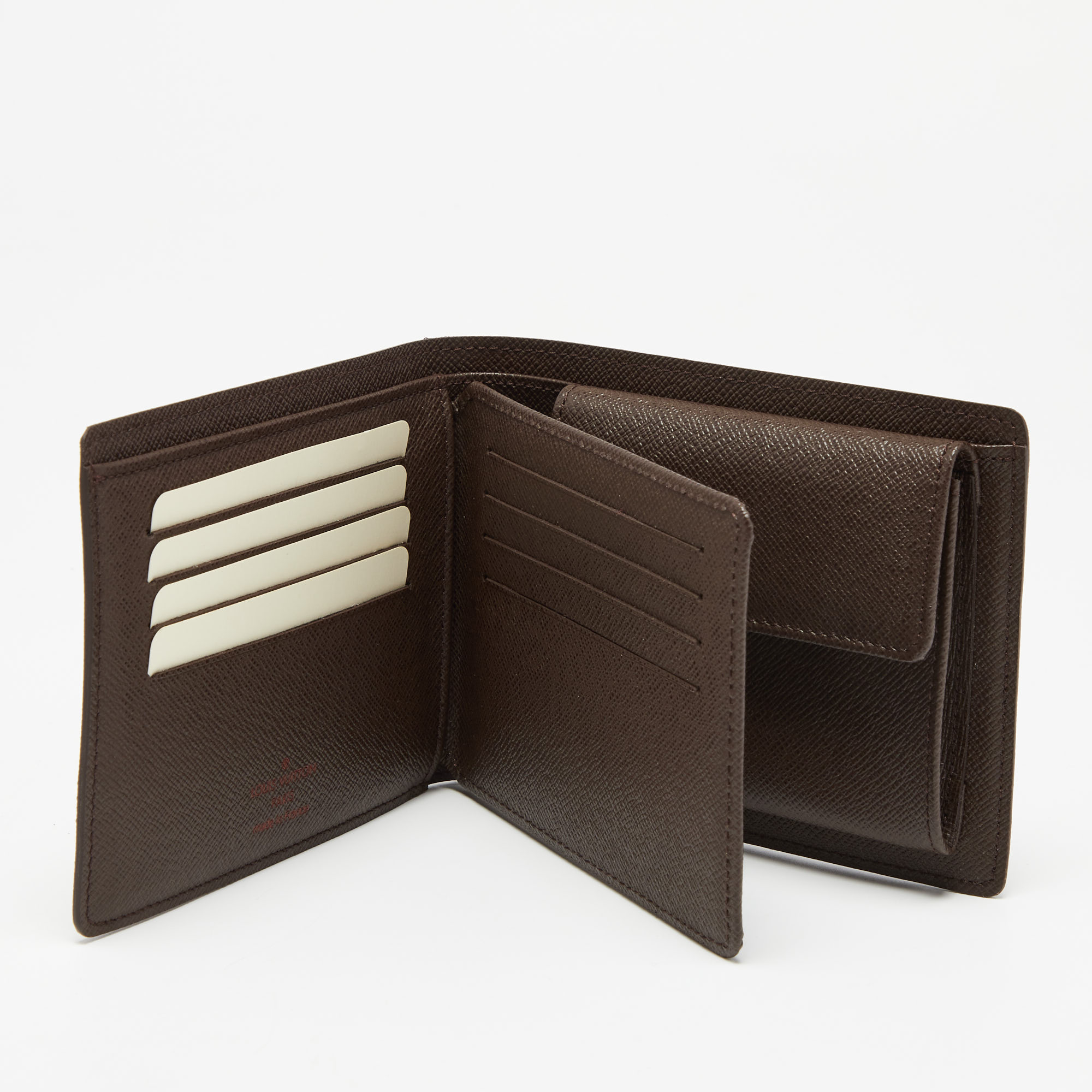 

Louis Vuitton Damier Ebene Canvas Bifold Wallet, Brown