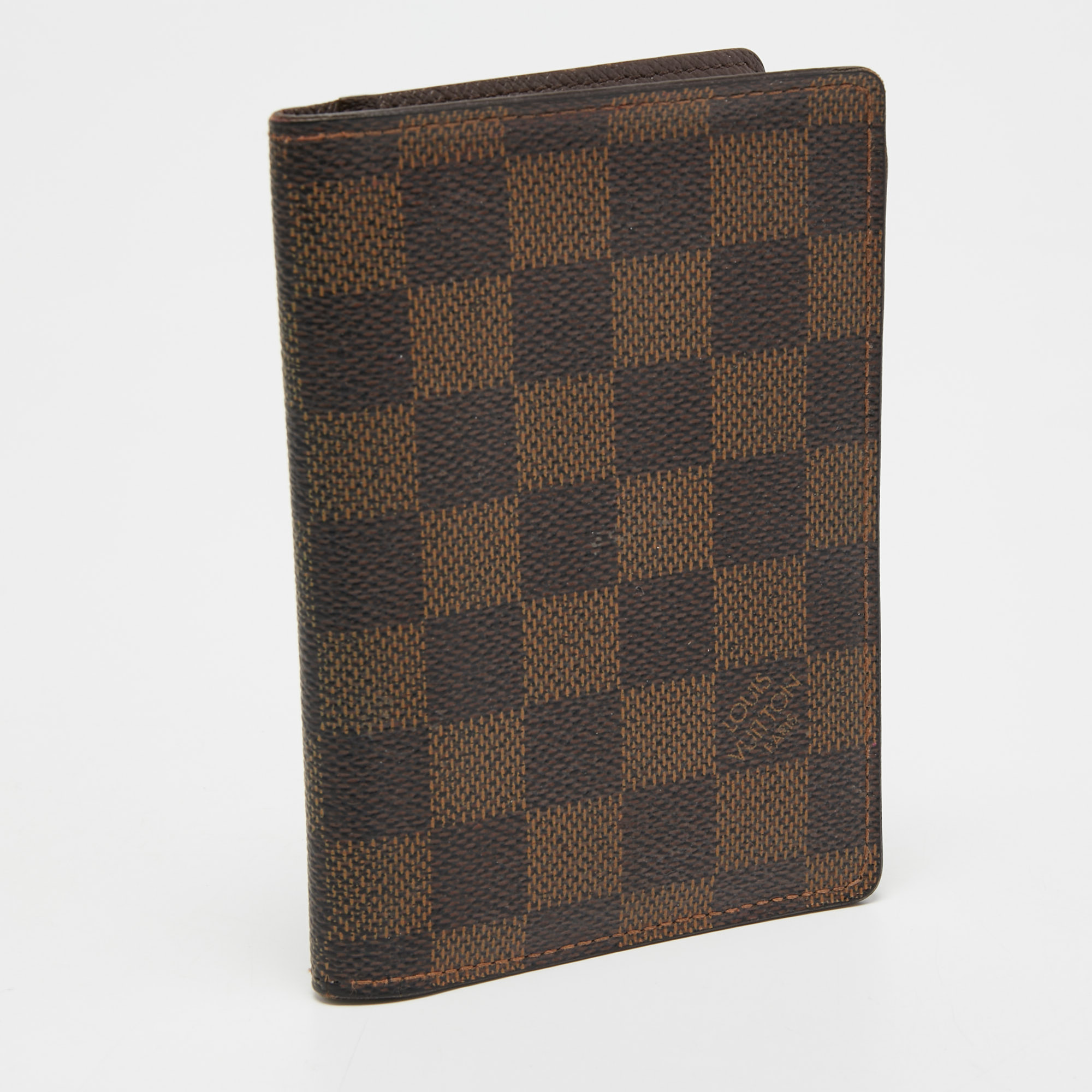 

Louis Vuitton Damier Ebene Canvas Passport Holder, Brown