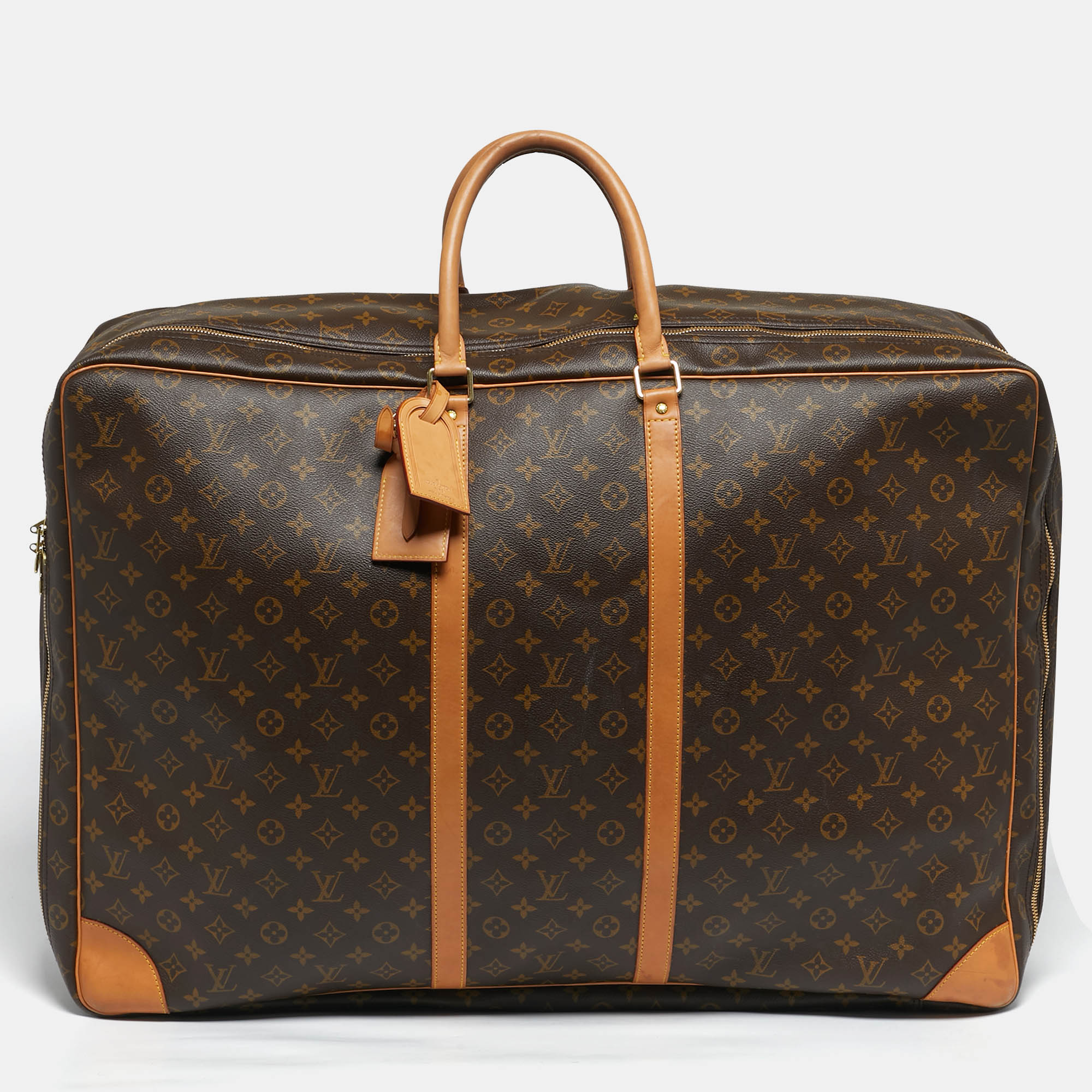 

Louis Vuitton Monogram Canvas Sirius 70 Suitcase, Brown