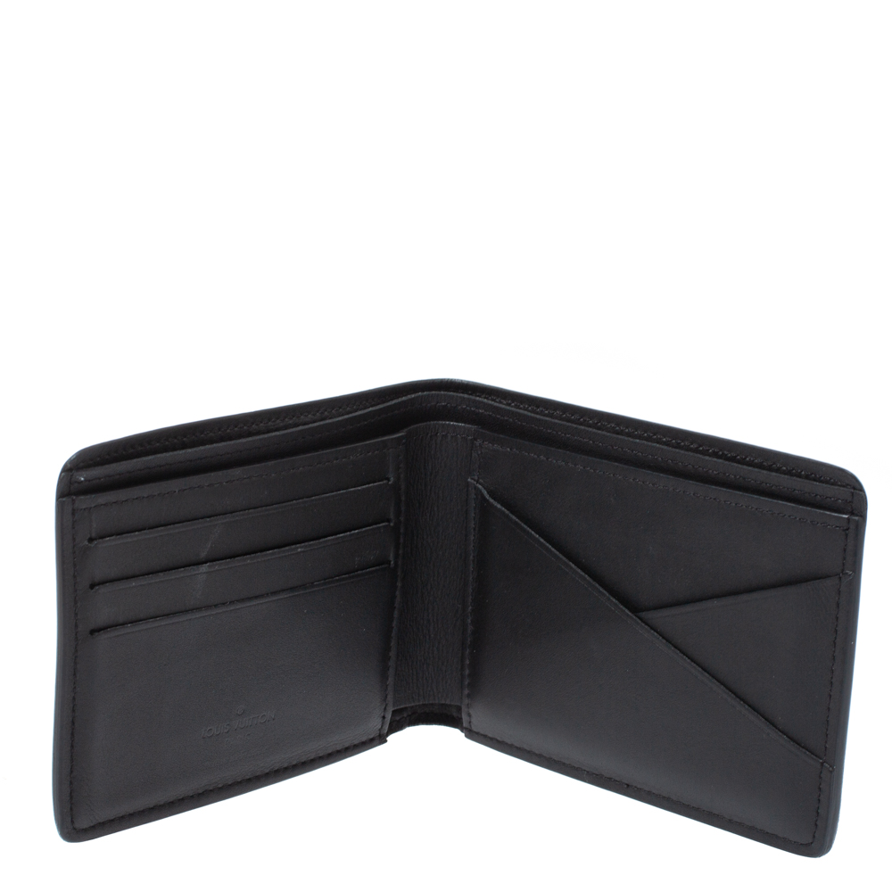 

Louis Vuitton Black Leather Monogram Embossed Multiple Wallet