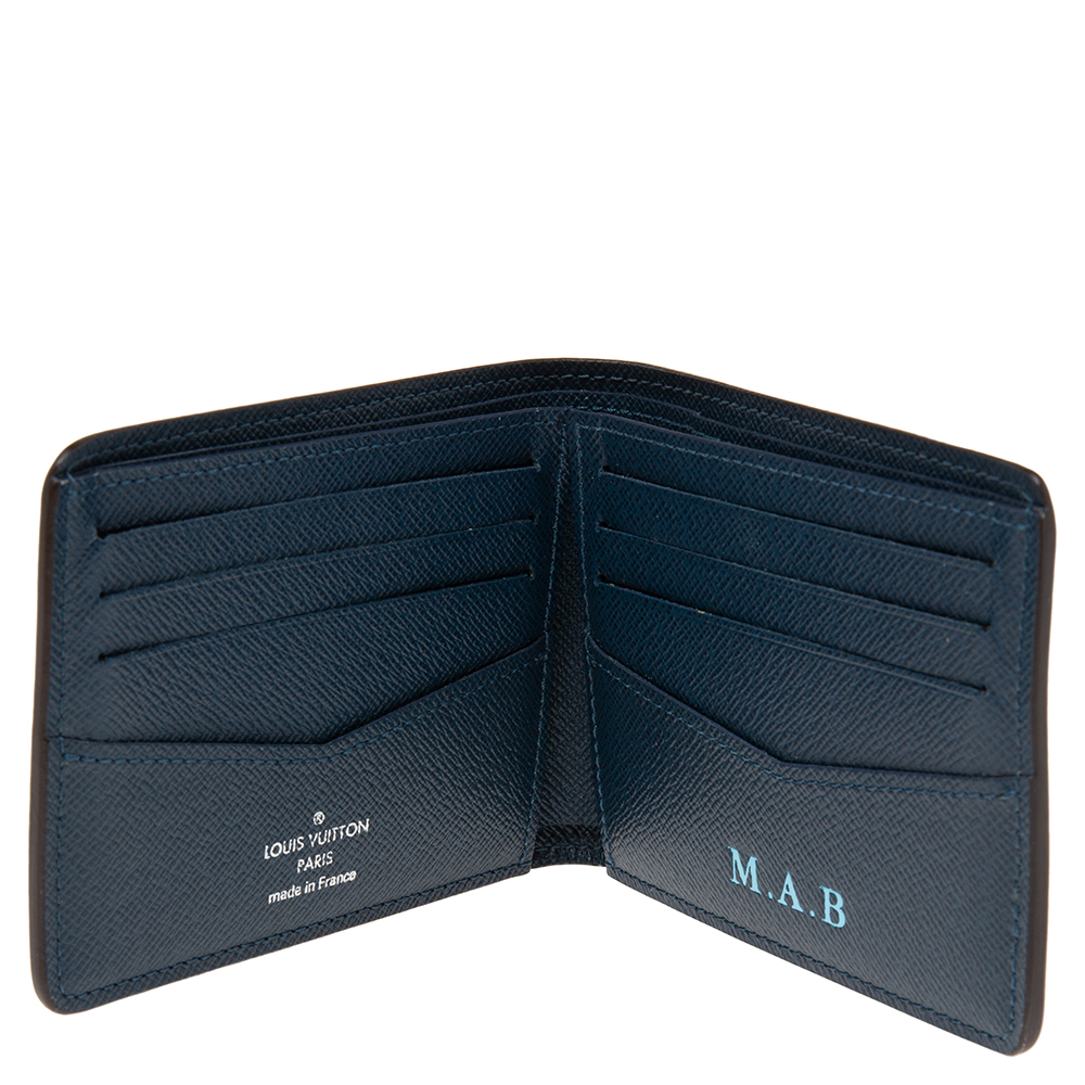 

Louis Vuitton Blue Taiga Leather Multiple Wallet