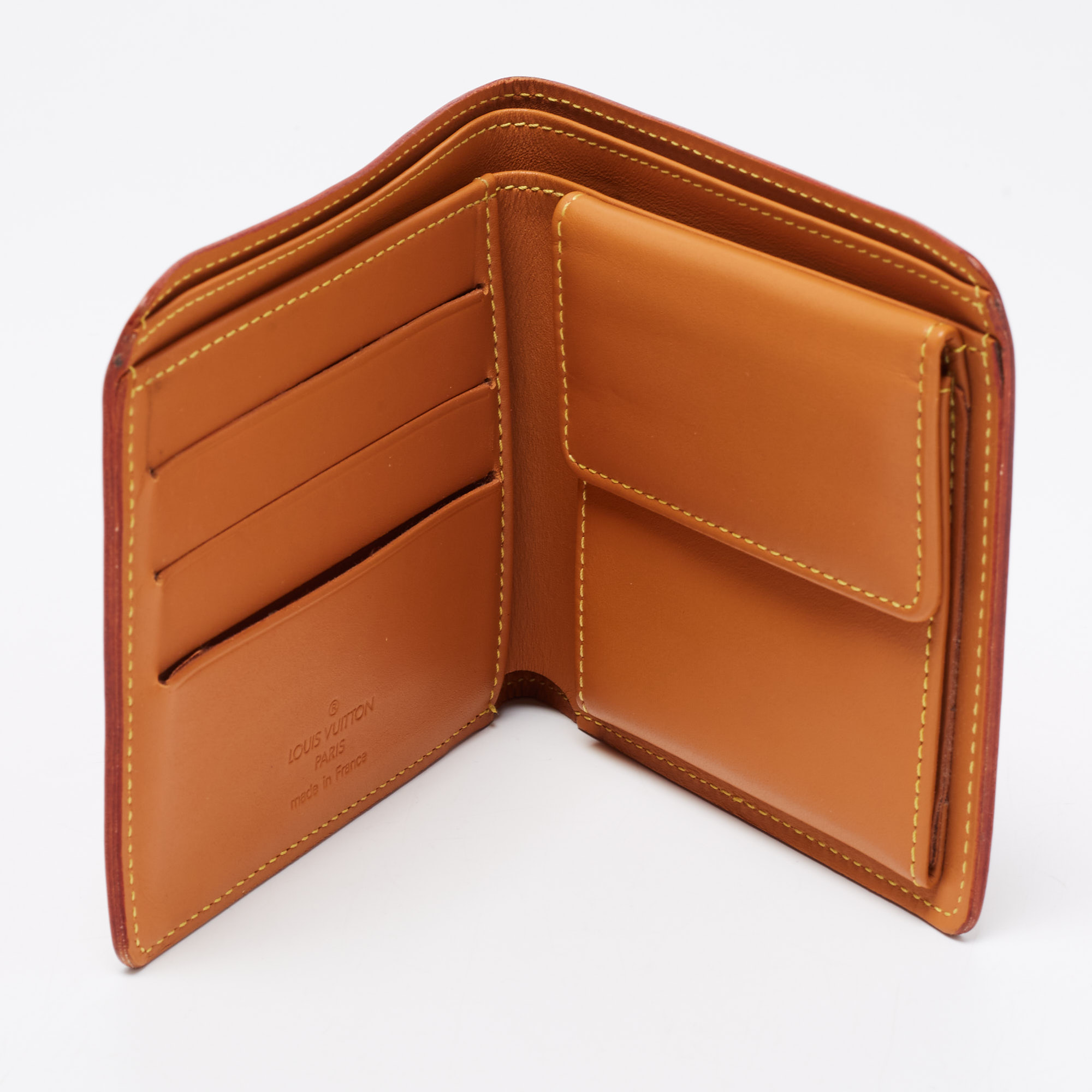 

Louis Vuitton Orange Nomade Leather Marco Wallet