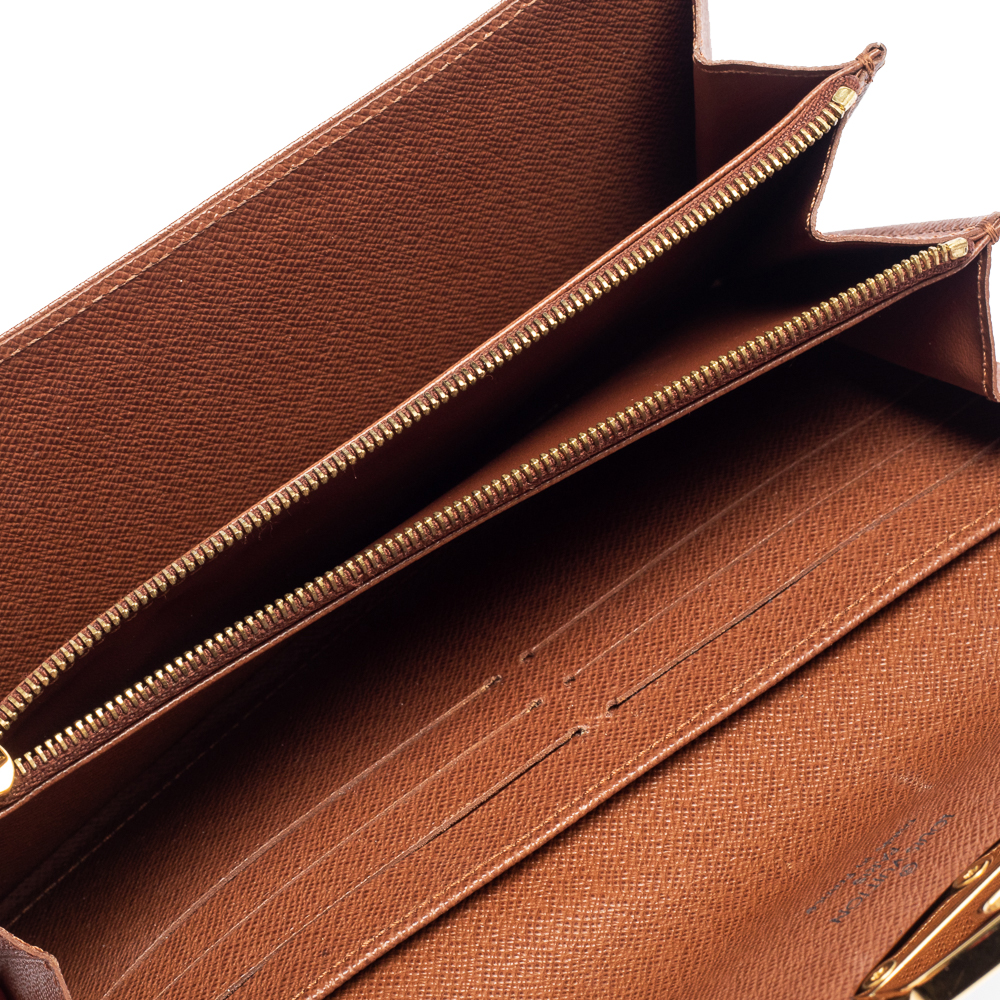 

Louis Vuitton Monogram Canvas Etoile Sarah Wallet, Brown