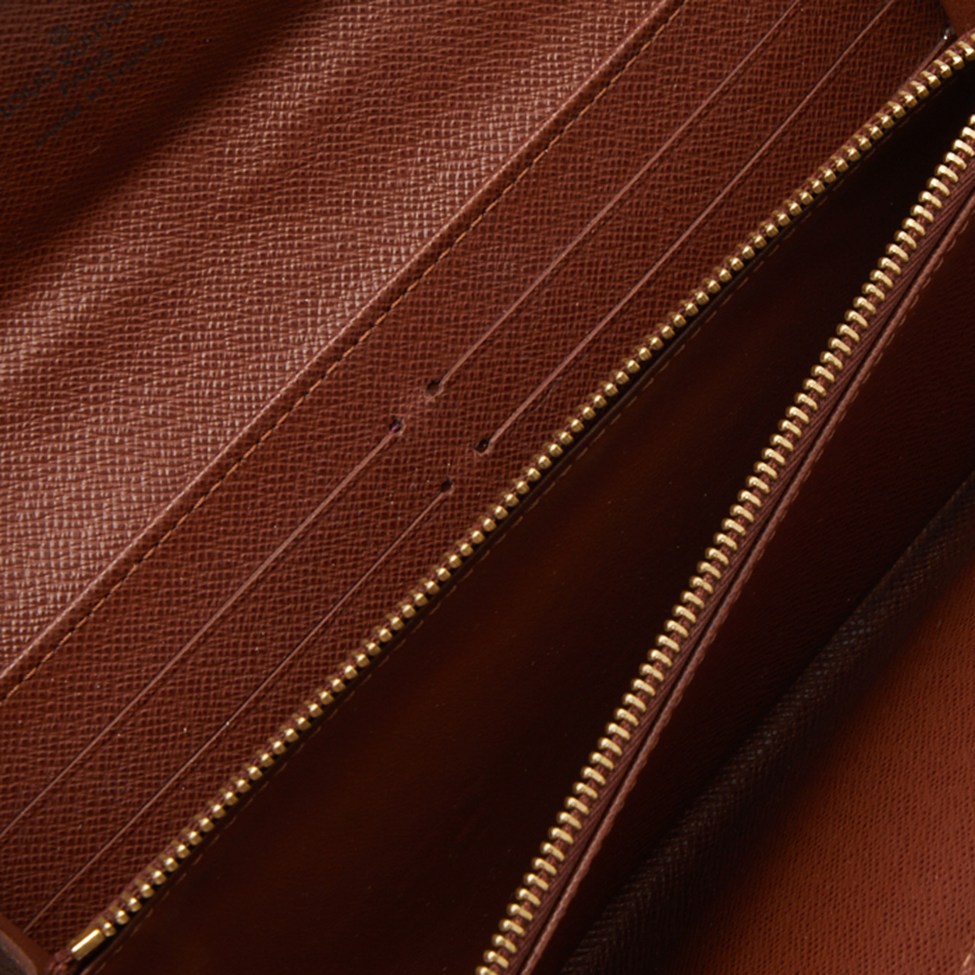 

Louis Vuitton Monogram Canvas Etoile Sarah Wallet, Brown