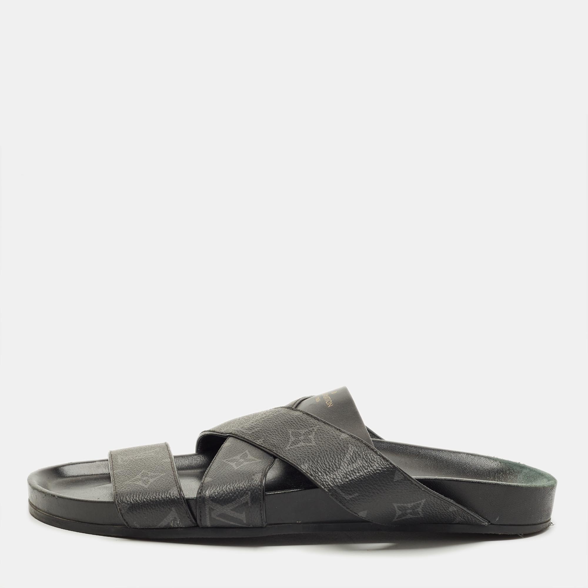 Click to view more detailed imagery on our partner's website Pre-owned Louis Vuitton Mirabeau Size 43 Black Canvas And Leather Crisscross Flat Slides