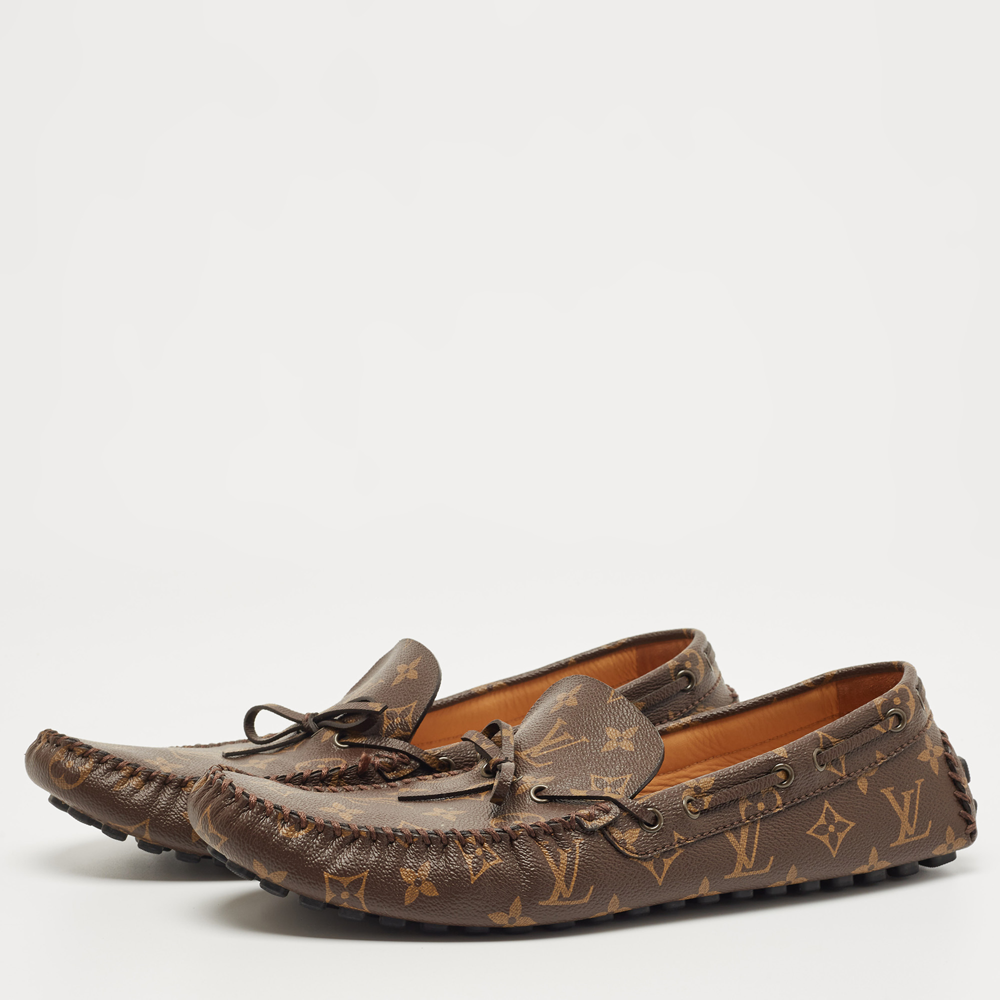 

Louis Vuitton Brown Monogram Canvas Slip On Loafers Size