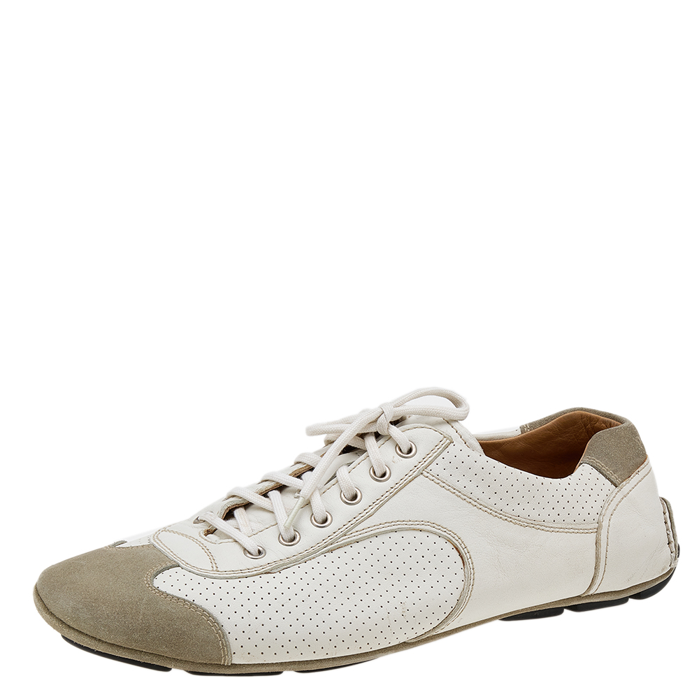 The House of Prada brings you these super stylish sneakers to elevate your appearance They are crafted using white grey leather and suede into a low top silhouette. They exhibit lace up fastenings and perforated details on the vamps. Walk with style and confidence in these sneakers