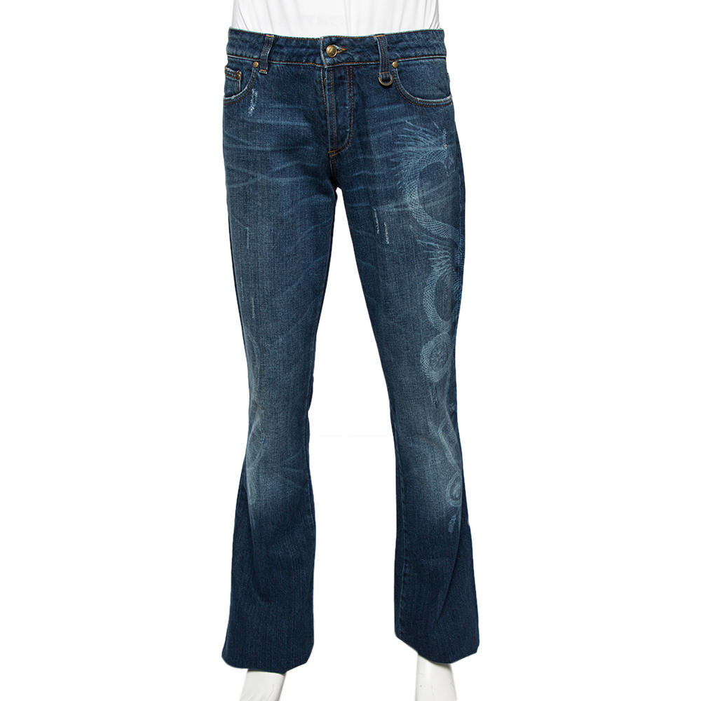 These blue denim jeans from Roberto Cavalli are perfect to enhance your style. The jeans are made of cotton into a bootcut silhouette and are designed with a dragon effect. They flaunt a button fastening at the front along with belt loops on the waistband. They are equipped with five pockets.