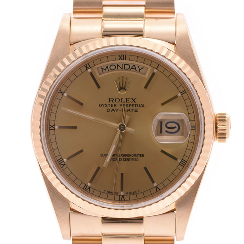 

Rolex Champagne Yellow Gold Day-Date