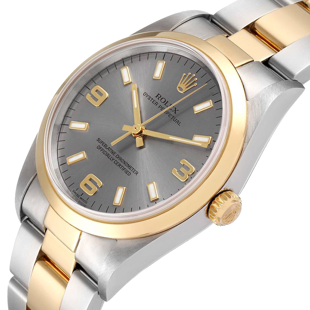 

Rolex Silver 18K Yellow Gold And Stainless Steel Oyster Perpetual 14203 Men's Wristwatch 34 MM