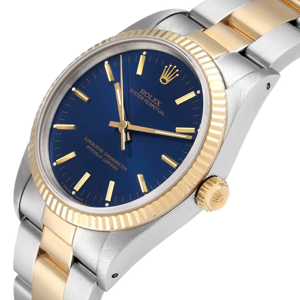 

Rolex Blue 18K Yellow Gold And Stainless Steel Oyster Perpetual Vintage 14233 Men's Wristwatch 34 MM