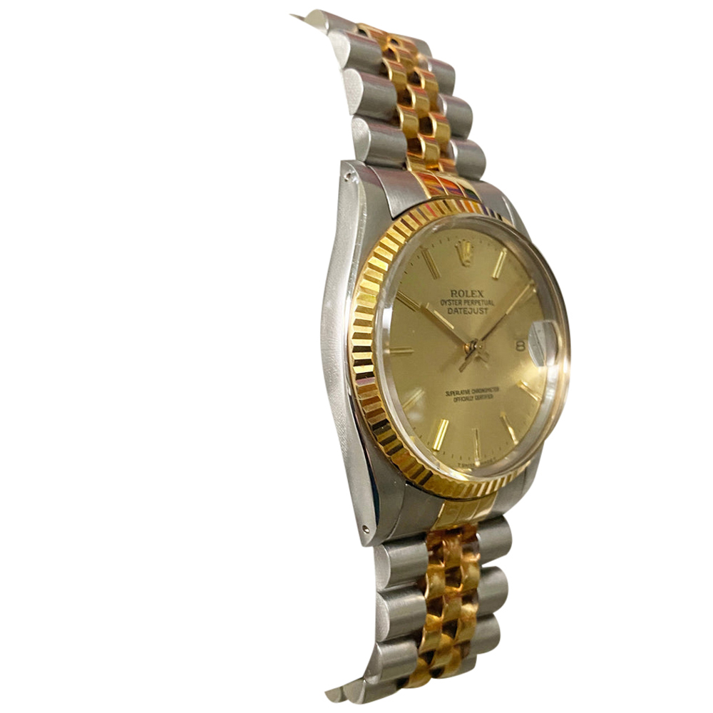 

Rolex Champagne 18K Yellow Gold And Stainless Steel Datejust 16013 Men's Wristwatch 36 MM