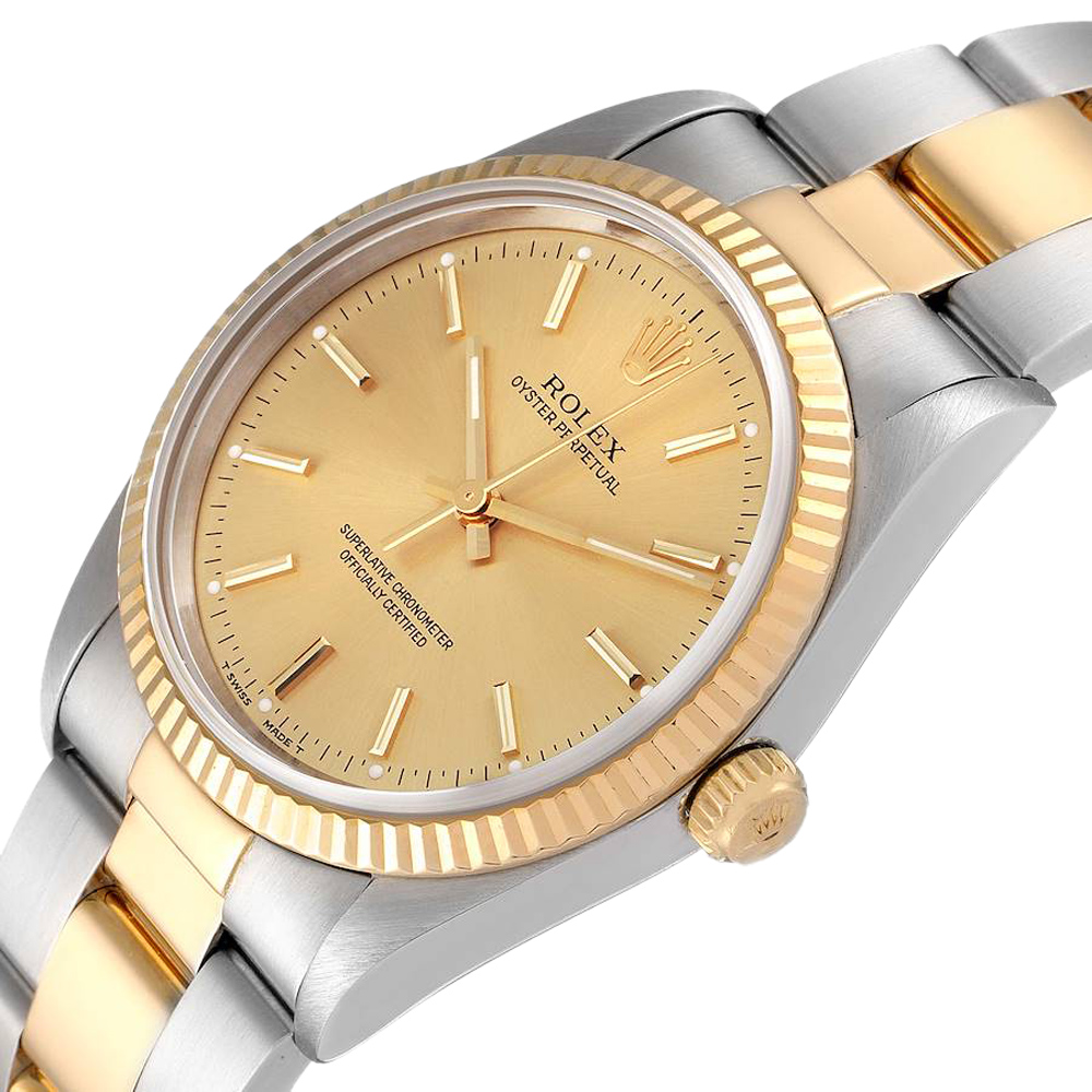 

Rolex Champagne 18K Yellow Gold And Stainless Steel Oyster Perpetual 14233 Automatic Men's Wristwatch 36 MM