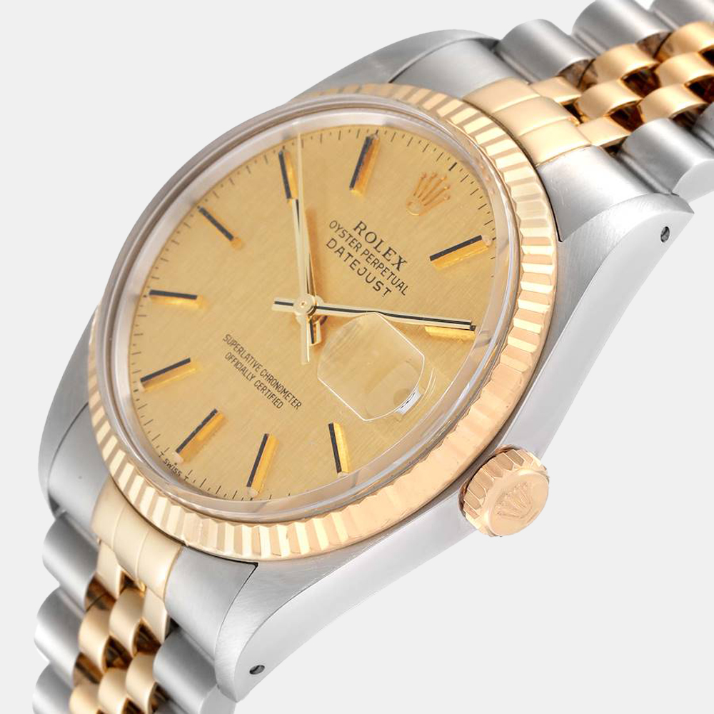 

Rolex Champagne 18k Yellow Gold And Stainless Steel Datejust 16013 Automatic Men's Wristwatch 36 mm