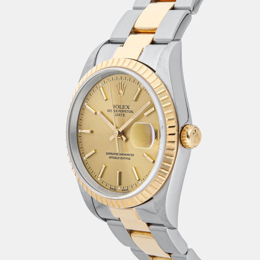 

Rolex Champagne 18k Yellow Gold And Stainless Steel Oyster Perpetual Date 15223 Men's Wristwatch 34 MM