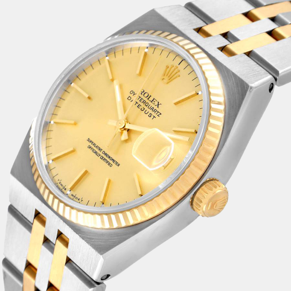 

Rolex Champagne 18k Yellow Gold And Stainless Steel Oysterquartz Datejust 17013 Men's Wristwatch 36 MM