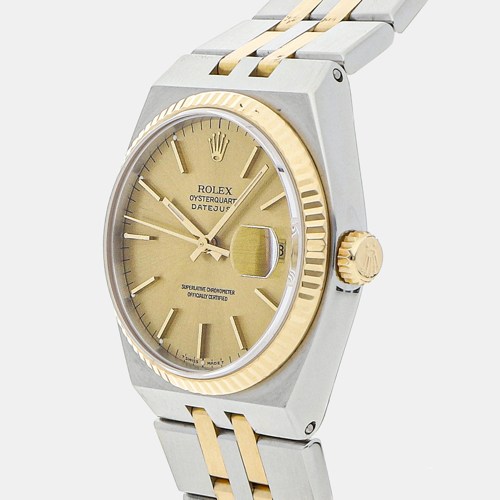 

Rolex Champagne 18K Yellow Gold And Stainless Steel Datejust Oysterquartz 17013 Men's Wristwatch 36 MM