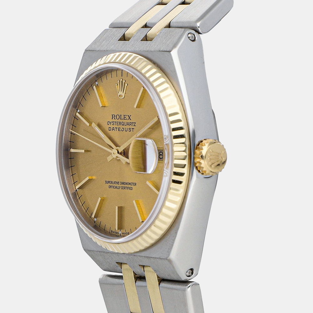 

Rolex Champagne 18k Yellow Gold And Stainless Steel Datejust Oysterquartz 17013 Men's Wristwatch 36 mm