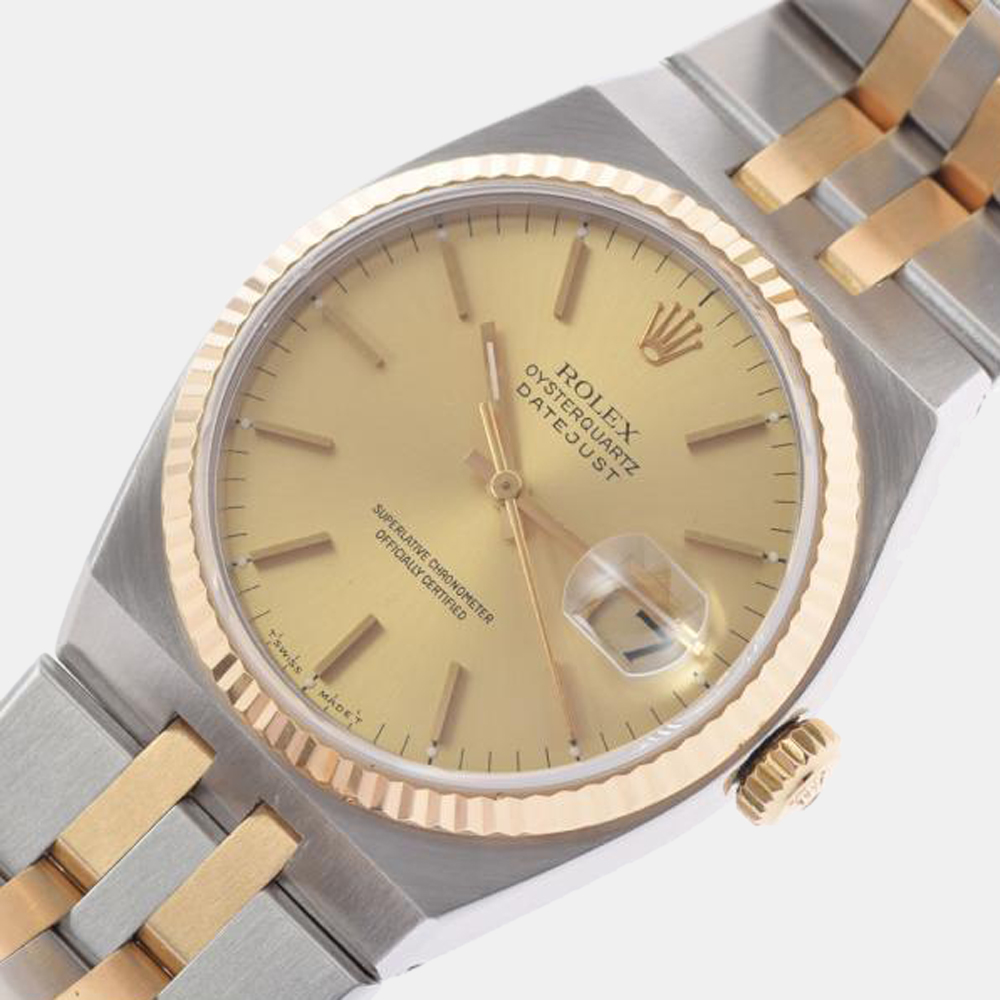 

Rolex Champagne 18k Yellow Gold And Stainless Steel Oysterquartz Datejust 17013 Automatic Men's Wristwatch 36 mm