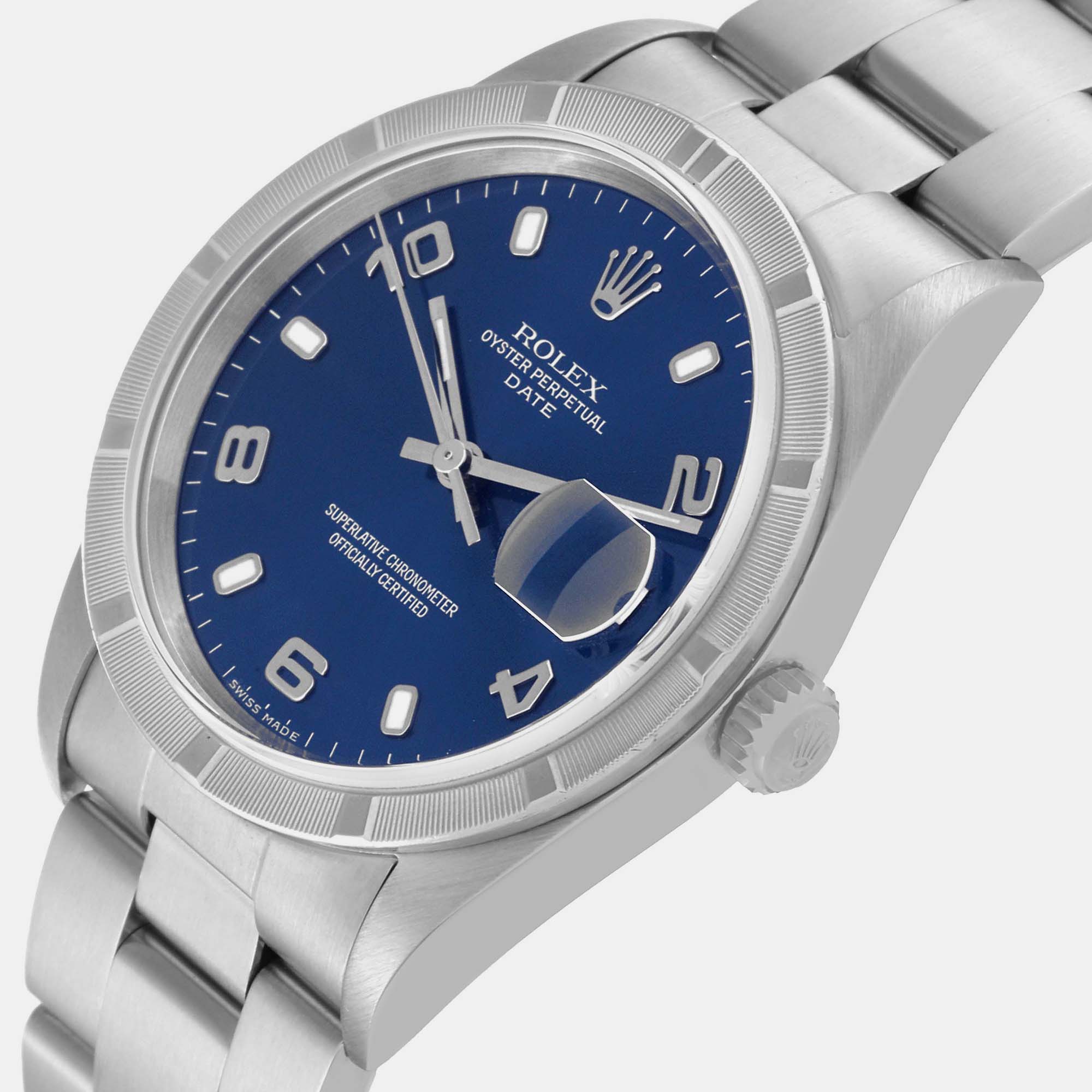 

Rolex Date Blue Dial Engine Turned Bezel Steel Mens Watch 15210 34 mm