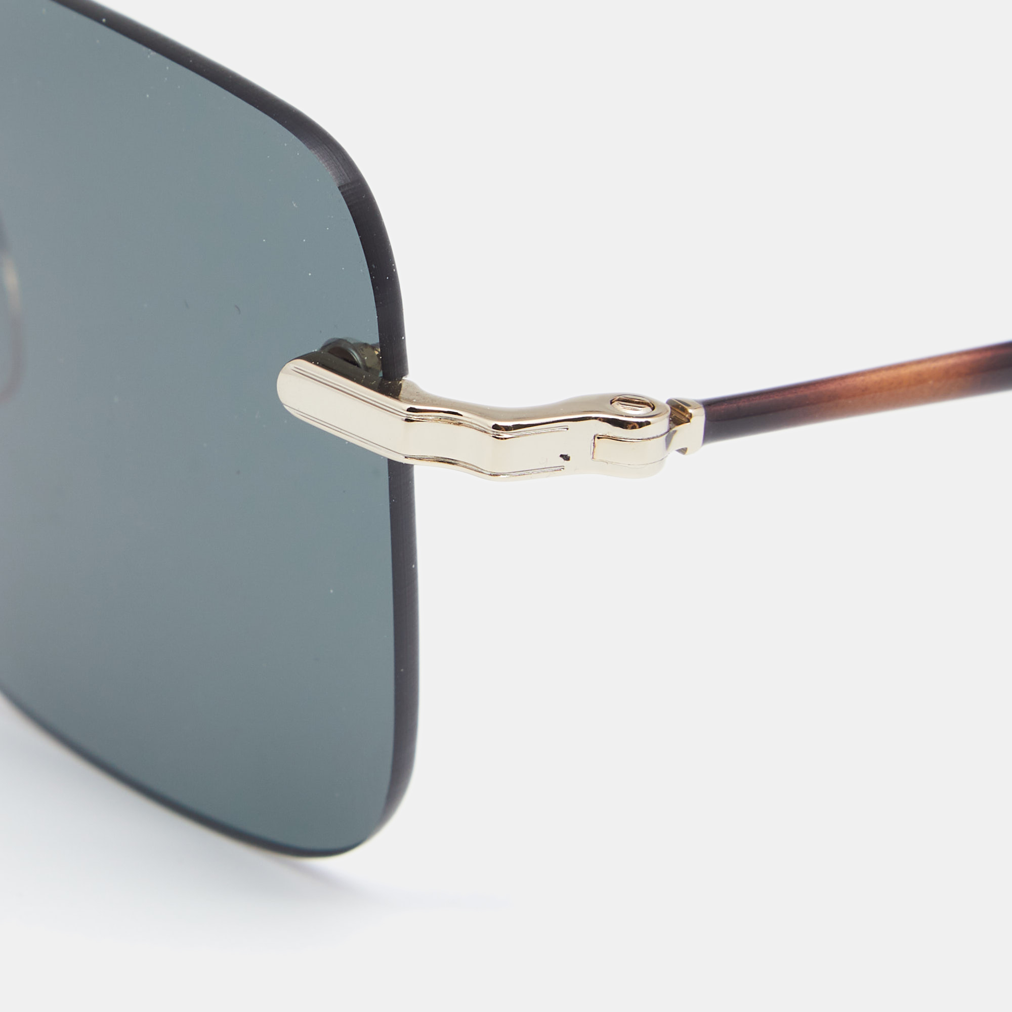 

Salvatore Ferragamo Gold Tone/Green SF225S Rimless Sunglasses