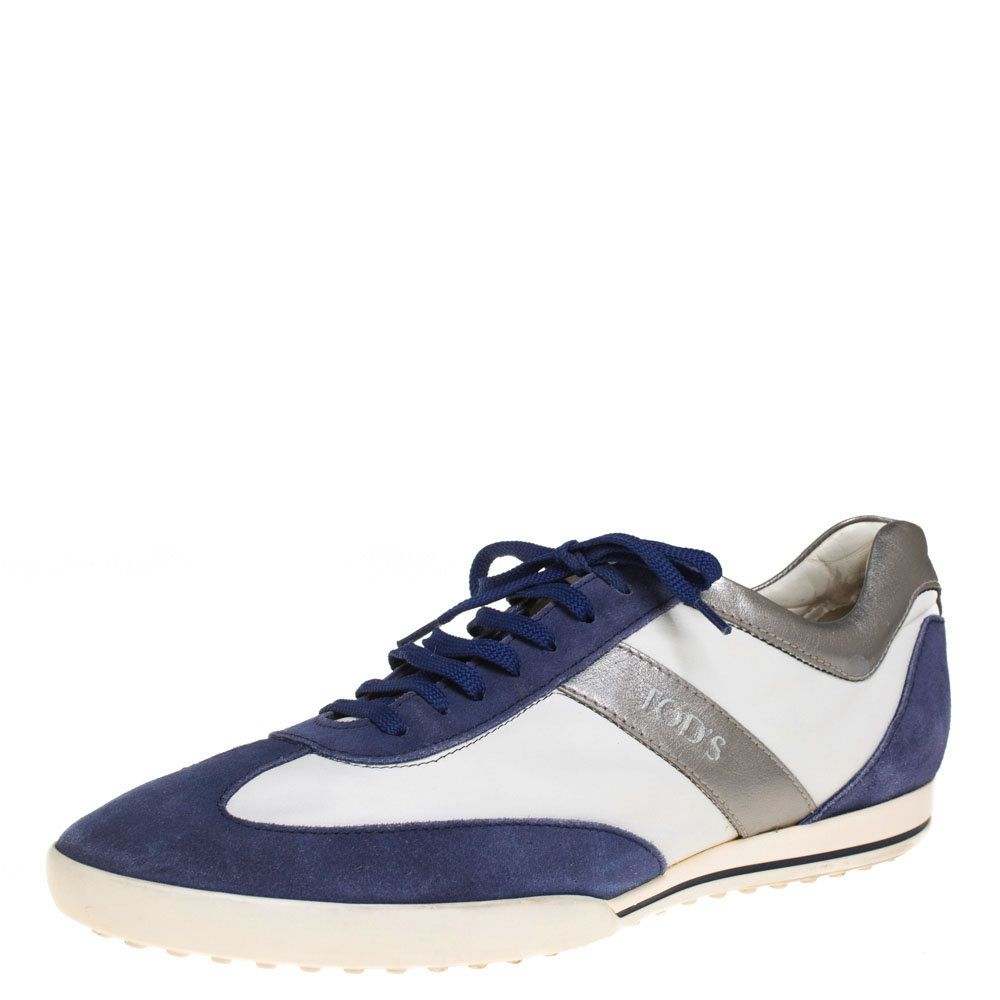 These blue and white sneakers from Tods are drool worthy. Made of a combination of suede and leather these sneakers feature lace ups at the front and are equipped with leather lined insoles. They come with tough pebbled soles that provide maximum comfort and project a trendy look. Pair these with denims and t shirts for a fun and casual day out.